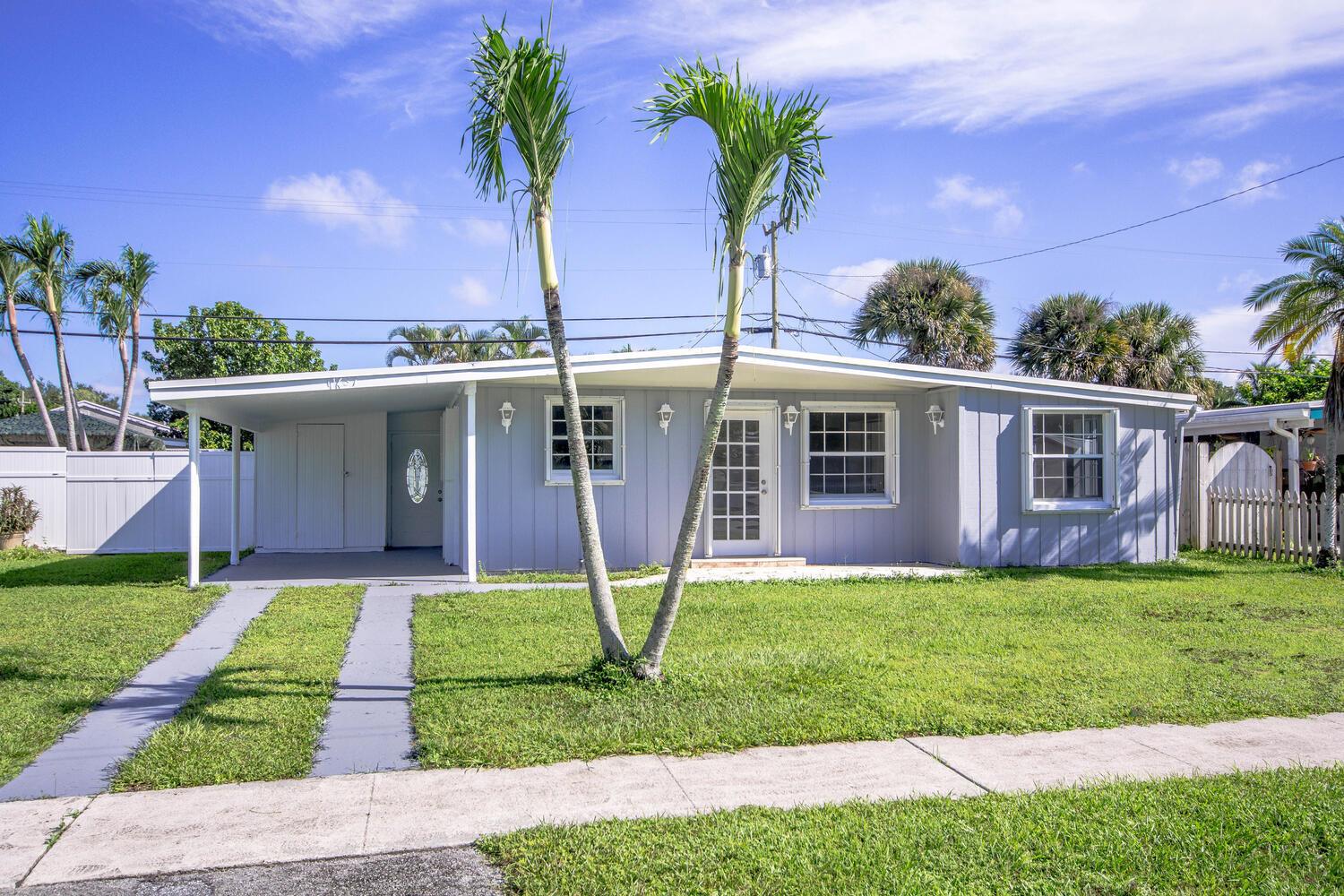 Description: Beautiful well-maintained single family 3BR/1BA in a desirable location in Royal Palm Beach. This home offers an updated kitchen with all new appliances and granite countertops, throughout the home is laminate, and tile flooring. This home also has a warm and bright sunroom. Great points include no HOA, Hurricane shutters, spacious fenced backyard, exterior storage, car port, exterior covered porch and many other options. Truly a must see. This home is located in a very convenient location near parks, beaches, stores, PBI Airport, and the interstate. Within walking distance of Commons Park, Costco plaza, restaurants and many stores.