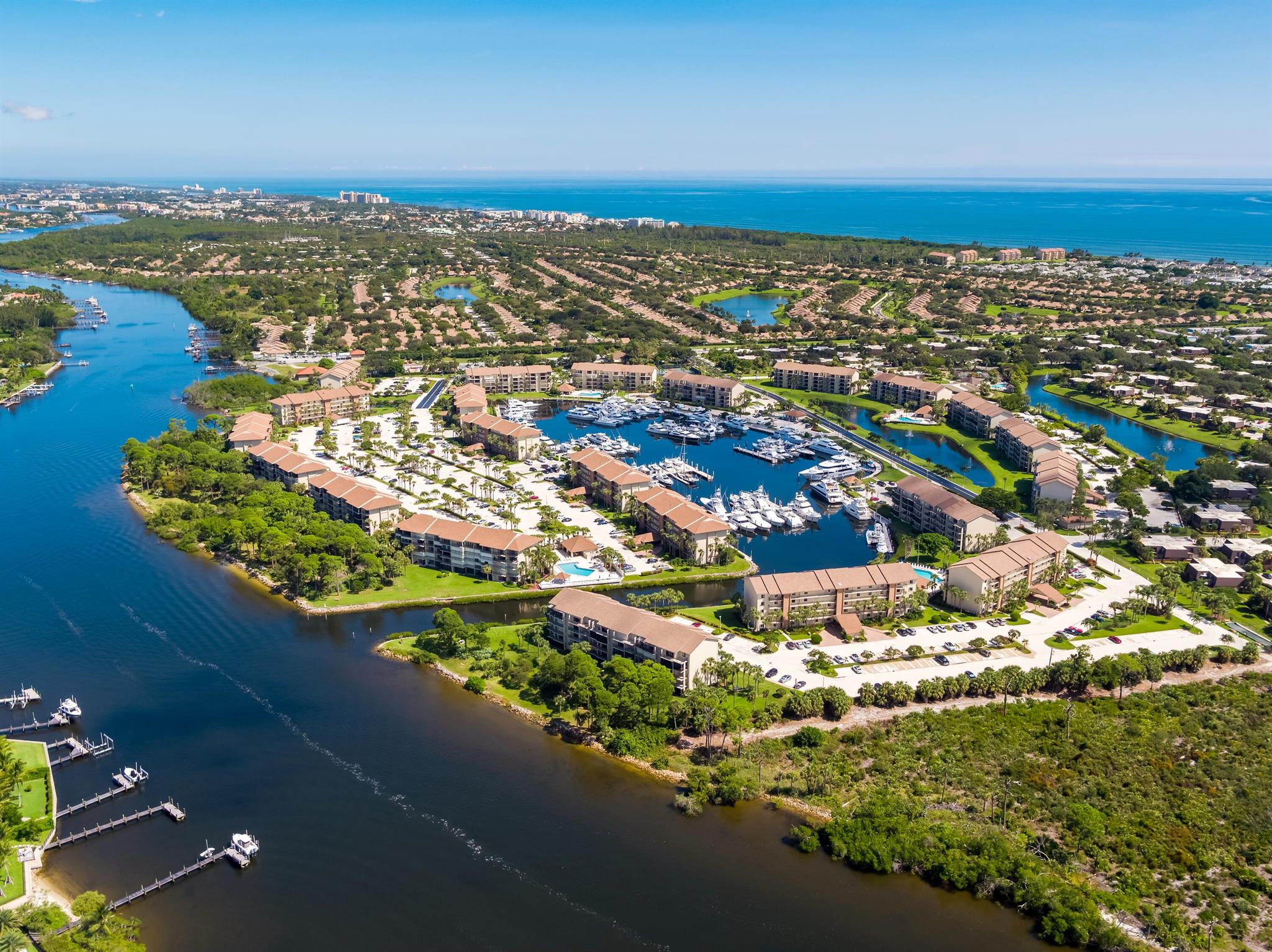 Enjoy the fabulous Intracoastal view from this Bluffs Marina 2nd floor condo! Offered fully furnished/turnkey complete with coffee pot!  Take your time to remodel and redecorate.  Eat in kitchen plus dining/living room with sliders to patio overlooking the stunning Intracoastal waterway.  Beautifully furnished the master bedroom has a large walk in closet and another balcony. plus the large laundry room which can accommodate an office or twin bunk beds, plenty of room for what you need. Resort Style amenities plus,  #ComeJoinUs at the lovely beaches of Jupiter offering over 3 miles of dog friendly beaches  just a mile or so down the road!  Fantastic restaurants and shopping at Bluffs Plaza, and just a few miles from Roger Dean Stadium, I 95 and downtown Abacoa and Alton. #LoveWhereYouLive