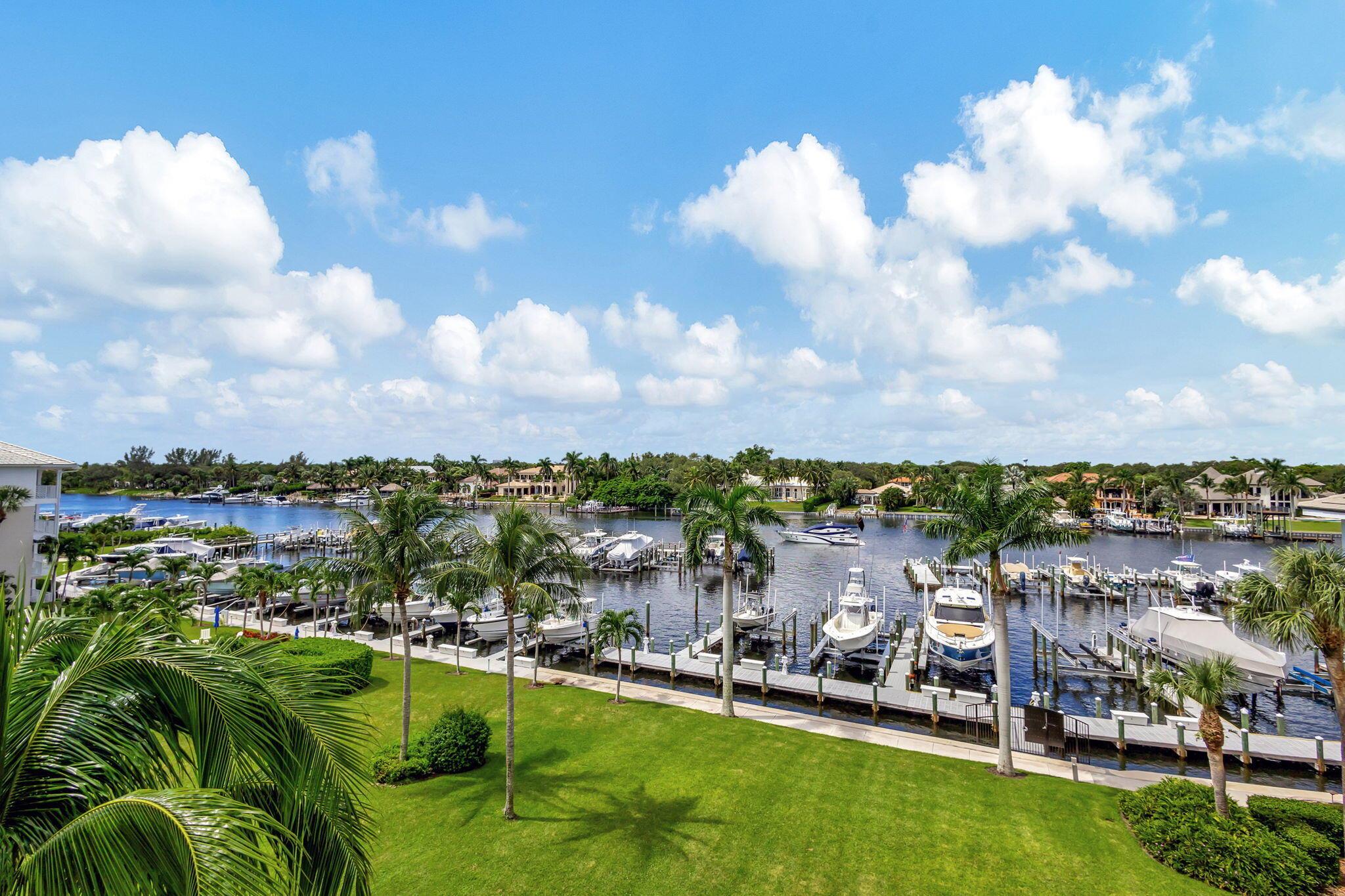 A BOATERS PARADISE! Penthouse. See your boat in it's Private Marina from this 3 Bedroom 2.5 Bath Condo Overlooking the Intracoastal Waterway. Beautiful, Open Floor Plan. 40' Boat Slip with a 24,000# lift included in the price. This is the largest model in the community with 2 covered balconies. Designer kitchen w/soft close cabinets & drawers, pull out shelves & Bosch appliances. Crown Molding. Walk-In Closets.Extra storage on floor. Amenities include Gym, Pool, Spa, Tennis, Pickle Ball, Bocce, Fire Pit & Clubhouse.