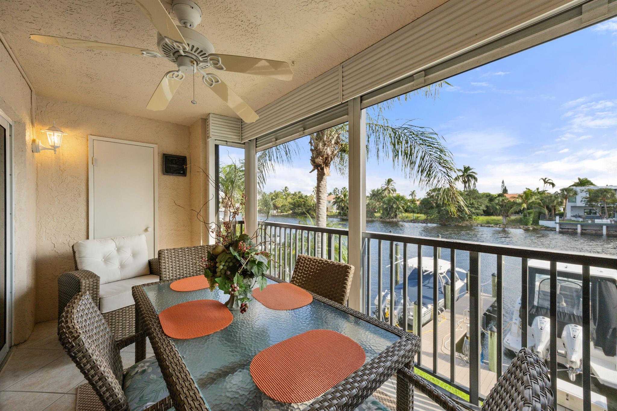 Discover the Ultimate Waterfront Living Experience. Immerse yourself in this elegantly decorated waterfront condo with immersive views of pristine waters, yachts and modern homes.  Relax and enjoy a dynamic space that blends modern simplicity with nature's elegance. With floor-to-ceiling glass windows, this home is optimized for natural light and spectacular sunrises and sunsets. The open-concept layout flows effortlessly. Unwind in the expansive living area, or retreat to the serene screened in balcony, designed to be your personal haven and let the breeze and scenery elevate your experience. Centrally located between Delray Beach and Boca Raton, you have the best minutes away where you can enjoy supermarkets (Whole Foods, Trader Joe's, Fresh Market and Publix) restaurants, beaches,