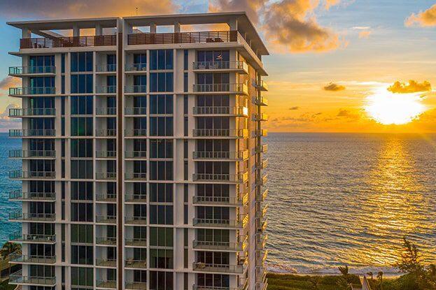 Have you ever dreamed of having an oceanfront home without the maintenance and upkeep? This residence offers just that:Providing the expansive feel of a single-family home with the ease and convenience of luxury condo living, this is the ultimate luxury beach house without the hassle! Enjoy idyllic Florida beachside living in this first-floor walk-out residence, nestled directly on the dunes at Singer Island's premier address, 5000 North Ocean.This one-of-a-kind Sandcastle residence has grandeur of a single-family home, boasting 12-foot ceilings, floor-to-ceiling windows and expansive living spaces.