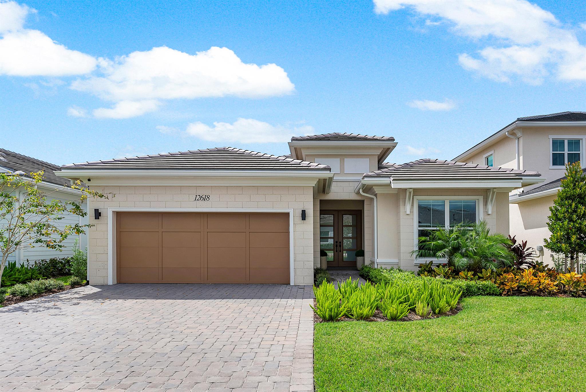 Nestled in the highly sought-after community of Palm Beach Gardens, this stunning 3-bed, 2.5-bath residence at Avenir offers modern luxury and comfort. Step inside to discover spacious, sunlit living areas, a gourmet kitchen with top-of-the-line appliances, and a tranquil master suite. The large great room has upgraded 16' expansive sliders leading to the inviting patio. lush green backyard is great for kids to play or a perfect space to build your own modern custom pool.Located just minutes from world-class shopping, dining, and beaches, this home blends the best of Florida living with elegant design. Your dream home awaits!