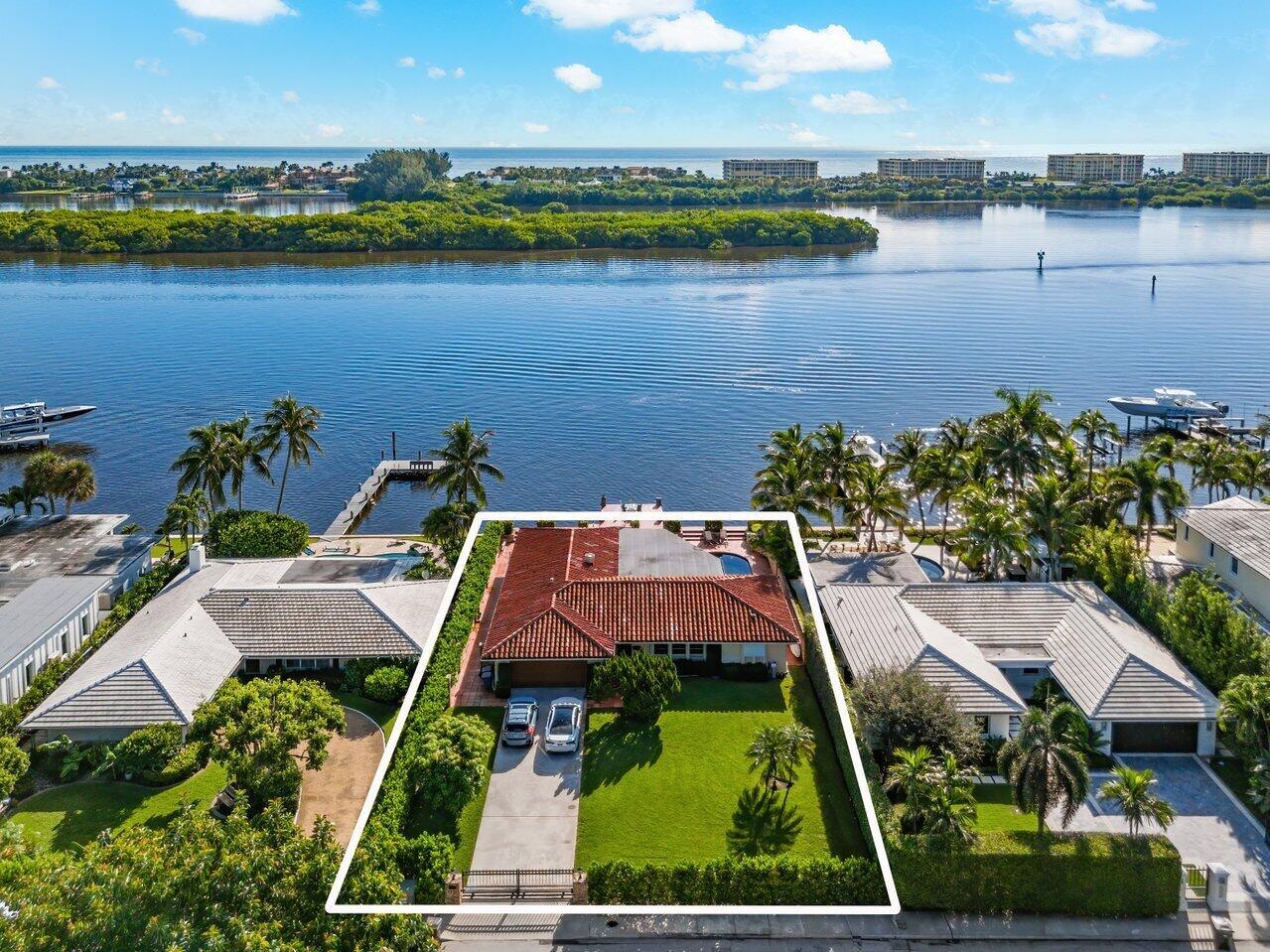 A rare opportunity to own 150 linear feet of direct waterfront in West Palm Beach's exclusive SoSo District! Two side-by-side 75 by 150 intracoastal waterfront properties, offered separately each with its own private dock, are available for sale. Spanning a total of 150 by 150 feet, or over half an acre, this remarkable offering provides endless potential. Whether you envision building a single, sprawling waterfront generational estate or two distinct luxury residences, the combined 22,500 square feet of prime lot footage allows for ultimate flexibility. Offering full privacy directly on the water, the property affords sweeping views of forested islands and effortless access to the intracoastal yet distant from the boating channel. Located just minutes from Palm Beach, PBI Airport,