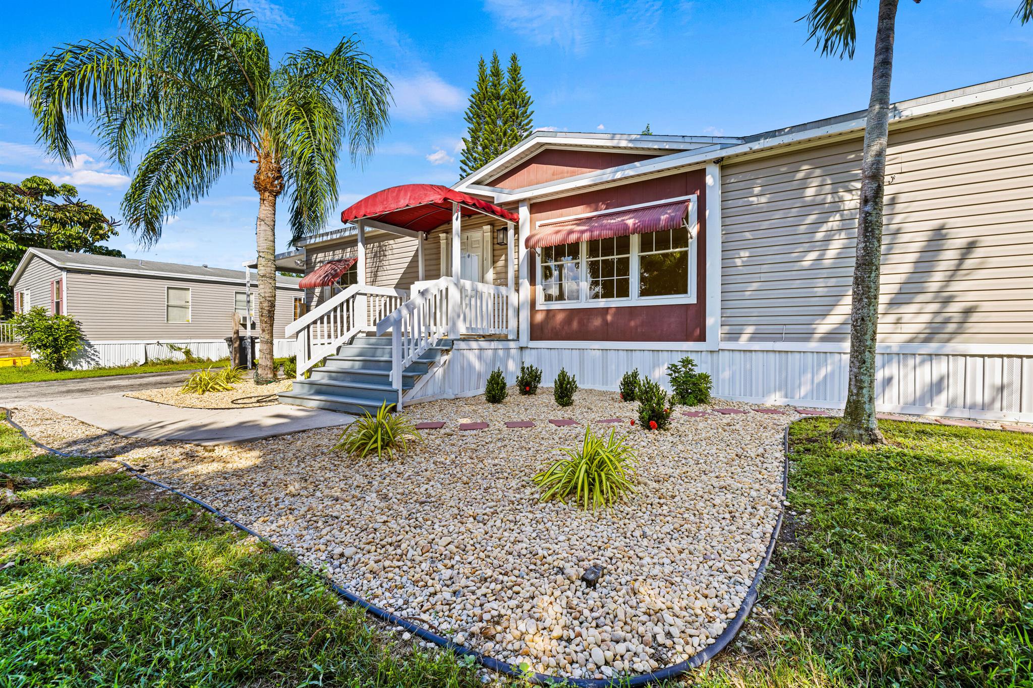 Smart and affordable manufactured home in high demand Watergate. YOU OWN THE LAND AND THE HOME! No HOA. This 3 bedroom, 2 bath split layout is newly renovated and ready for you. One of the most premium lots in the neighborhood, over double the size of the standard lot. Walking distance to shopping A-Rated schools and all of your conveniences.