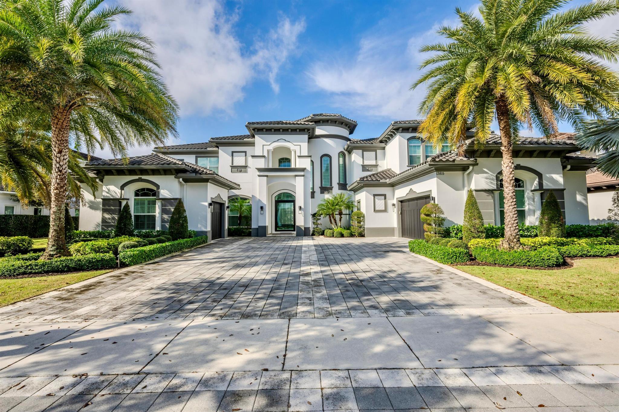 A Boater's Paradise! Fantastic custom-built luxury home in exclusive gated community of Frenchman's Harbor. With over 100' of direct intracoastal water frontage, this home has a dock that can accommodate up to a 70' boat and a new 4 jet ski lift and platform. Interior updates done Summer 2024. The backyard was completely renovated in Nov 2023 with a brand-new pool, Jacuzzi, and fire pit. New outdoor deck and lush landscaping, this backyard is perfect for entertaining. No detail was overlooked in this modern, luxury home. 7 full bedrooms, 7 full bathrooms, 2-1/2 baths, a private elevator, heated lanai, outdoor kitchen, and 3-car air-conditioned garage.