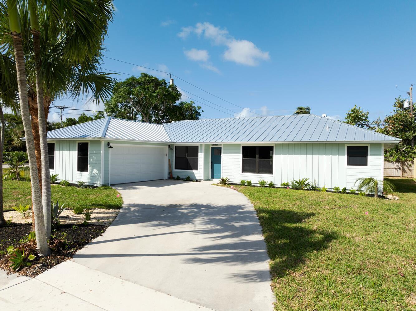 Price adjustment-motivated to sell! You are invited to experience this truly one of a kind home in Tequesta Village just minutes away from the pristine beaches Jupiter Florida has to offer and sitting on a large corner lot. The home has 3 bedrooms 2 and I/2 baths, a den and the exterior and interior have been completely renovated with exceptional craftmanship and designer finishes. Brand new metal roof, all new hurricane windows and sliders, new high end appliances, a new air conditioning unit, along with being fully wrapped in fiber cement siding, providing exceptional durability and elevated curb appeal, just to name a few of the many other upgrades and surprises that adorn this home. Additionally, this home is uniquely excluded from the communities HOA.