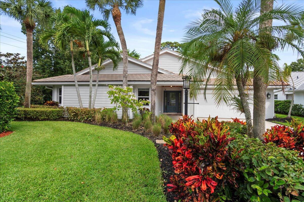 Welcome to 5863 Stonewood Ct. in Woodland Estates, Jupiter. Don't let this opportunity pass you by! Woodland Estates low HOA fee includes a community pool, tennis court & clubhouse! This wonderful 3 bed, 2 bath CBS home in Woodland Estates features a newly renovated kitchen, luxury vinyl plank flooring, vaulted ceilings, open floor plan, Impact Windows, concrete tile roof, beautiful custom finishes and WHOLE HOME GENERATOR. The amply sized primary suite features a spacious walk-in closet, with an additional custom closet too! Ensuite has a separate tub, walk in shower and double basin vanity. This split floorplans 2 other bedrooms are located off of the kitchen den area at the front of the home. Retire in the evenings on your private outdoor sanctuary featuring a fully screen enclosed tile patio equipped with all of the necessary hook up for your own outdoor kitchen. Enjoy the parklike setting that is Woodland Estates. Sidewalk and tree lined lakes with benches for relaxing, a wonderful community feel. Just a short distance to the community pool, tennis court and clubhouse/ cabana. Located close to Florida's beautiful beaches, shopping, dining, World Class Golf, Fishing and many other recreational activities. Abacoa and Roger Dean Stadium are close by and you're about a 30-minute drive south to PBI Airport. Woodland Estates offers a community pool, tennis courts and sidewalks throughout. AC 2022/24, H2O Heater 2017, Tile Roof 2005. Homes in this neighborhood are rarely available and highly desired.