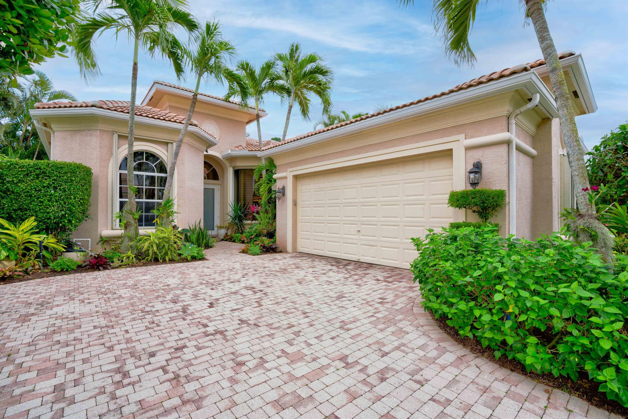 Motivated Seller!!  Enjoy the ease of country club living in one of the finest, award-winning private club communities in South Florida, The Country Club at Mirasol. This 3BR/3BA home has a spacious, open floor plan overlooking the desirable swimming pool/spa area. Tankless water heater, beautiful kitchen, and a most desirable floor plan. Only a short distance to the endless amenities at the Club: two 18-hole golf courses, expansive practice facility, spa, fitness, tennis, pickle ball, dining, and a dedicated kids sports club area. The unparalleled services and club offerings define the quintessential country club lifestyle. Some photos are virtually staged.