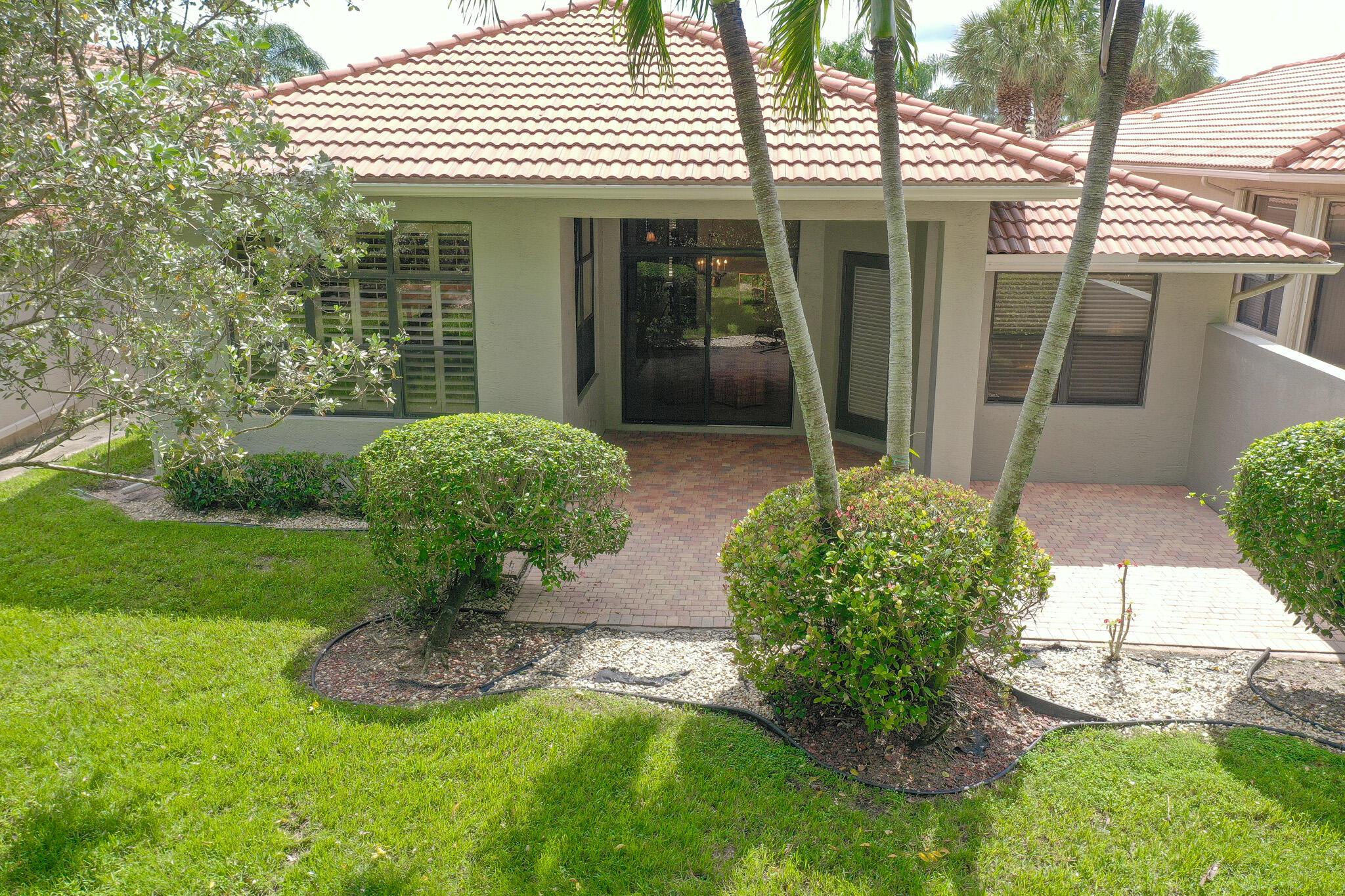 Discover the perfect balance of privacy and open space in Tivoli Lakes, Boynton Beach. The extended brick paver patio, with no rear neighbor, offers the perfect setting for ''Alfresco dining.'' Tivoli Lakes is known for its active tennis & pickleball lifestyle. The Sauvignon model, the largest in the Vintage Collection, features both a living room and family room with extensive wall space to showcase your art and travel treasures. Beautiful neutral tile, laid in a staggered pattern, lends to an upscale touch, while high volume ceilings with crown molding and abundant glass create a bright and airy atmosphere that brings the outdoors in. The fantastic kitchen features light wood cabinetry with under cabinet lighting, cabinet crown molding, lazy susan, and a tumblestone backsplash. Stainless steel appliances, granite countertops, and a large-raised breakfast bar make it the perfect HUB for entertaining.

The primary bedroom offers patio access, perfect for enjoying your morning coffee. Two large fully outfitted walk-in closets provide plenty of storage. The primary bath makes a bold statement with an oversized shower, a central roman tub, and split vanities, offering abundant cabinetry and counter space. 
The guest bedroom includes a fully outfitted closet with a safe. The powder room is beautifully appointed with a unique wood vanity and custom finishes on the walls.

You do not want to miss this move-in ready pristine home. Other notable features include, central vacuum, 2021 W/H, crown molding thru-out, laundry room cabinets with refrigerator, plantation shutters and silhouettes. THIS HOME CAN BE SOLD FURNISHED.

The amazing amenities have gotten so much better with the renovated clubhouse...including social hall, arts &amp; crafts, card rooms, billiards, large resort style pool, hot tub, children's waterworks area, bocce ball, pickleball, &amp; Har-tru tennis with stadium seating. Tivoli Lakes is known for its active tennis/pickleball programs. There is a separate fitness center with state-of-the-art equipment, aerobics room &amp; sauna.

HOA fees include house painting, roof pressure washing, landscape maintenance, irrigation, cable, internet access to all amenities and 24 hr. guard gate. Centrally located near turnpike, places of worship, beaches &amp; tons of shopping including Canyon town center, and Cobblestone Commons. You do not want to miss this one!