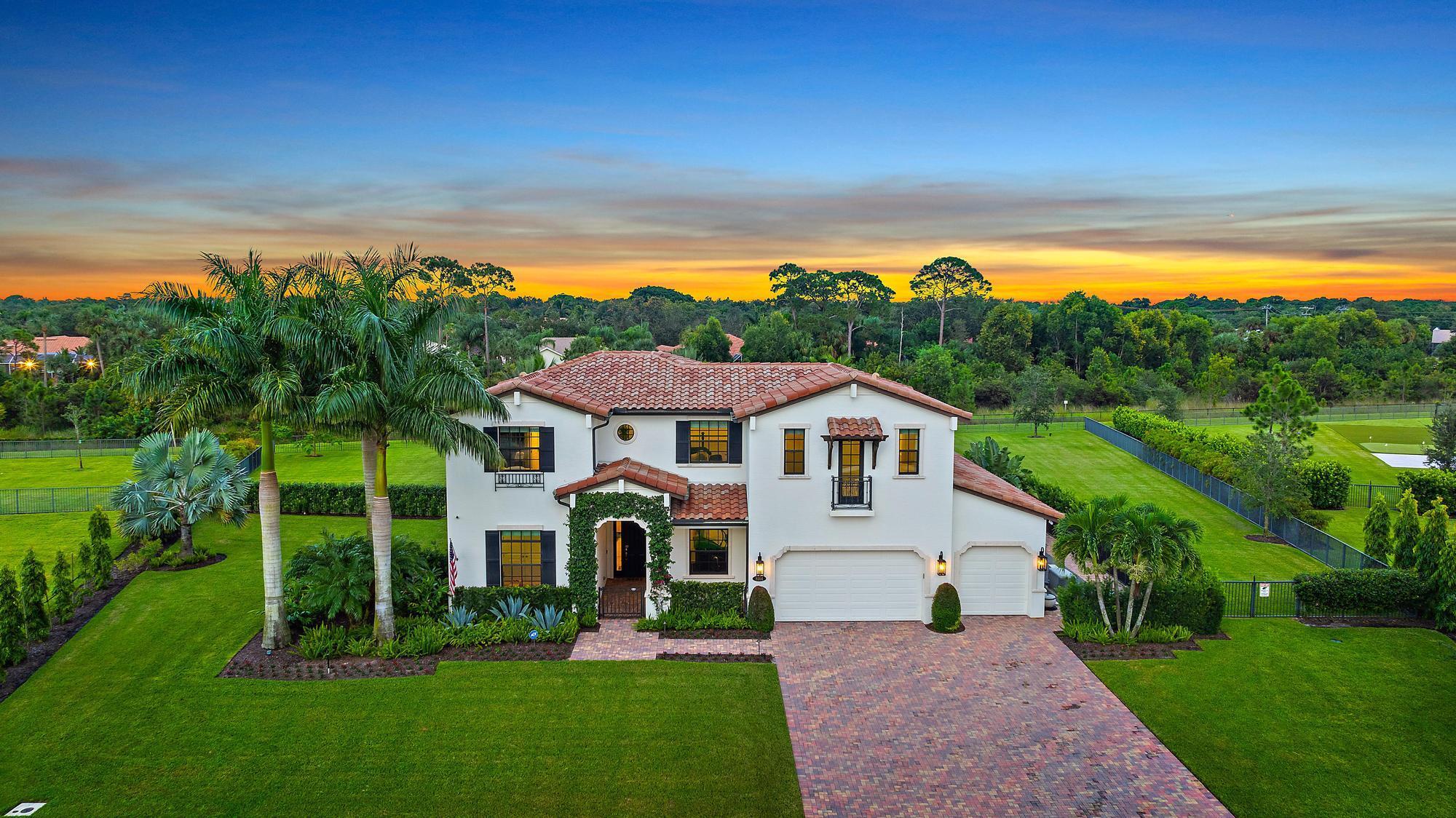 GORGEOUS, 5-bedroom + home gym and loft, 5.1-bathroom estate located in the esteemed and gated community of Prado in Jupiter, Florida. Available annually or seasonally starting November 15th! This Alexandria model, built in 2018, sits on just over 1 acre and offers more than 4,500 sq ft of luxury living space. With soaring high and coffered ceilings, marble flooring throughout the first floor and wood upstairs, a stunning white kitchen with high-end appliances, and the ultimate backyard boasting a heated pool and spa, covered patio with the automatic screens, outdoor fireplace and full summer kitchen - this home is designed for ultimate enjoyment and entertaining! As you enter through the grand front door, you're greeted by soaring ceilings and marble floors that extend throughout the first floor. The expansive family room flows effortlessly into the open kitchen and dining space, ideal for family dinners. The custom white kitchen boasts high-end appliances and finishes, including Quartzite countertops, Wolf 5-burner gas stove, double ovens, Subzero refrigerator, and a spacious island. Large glass sliders lead to the outdoor covered patio, making indoor-outdoor living seamless.

On the main floor, you'll find the home gym, the 5th bedroom with an en-suite bathroom (currently used as an office with a pull-out king-size sofa bed), and a convenient full cabana bath with granite countertops and a frameless glass shower. The large laundry/mudroom and 3-car garage provide ample storage and utility.

Your primary suite is a private sanctuary, complete with marble floors as well as his-and-her walk-in closets with built-ins that offer an ample amount of storage. The spa-like en-suite features a soaking tub, a walk-in shower, dual vanities with white quartz countertops, and espresso cabinetry.

Head upstairs to find an open loft area, perfect for a kids' or guests' family room, along with 3 additional bedrooms. Two with a jack and jill shared bath, beautifully updated with double sinks, quartz countertops, and a frameless glass shower. The additional expansive bedroom with its own en-suite bath and a large walk-in closet rounds out the second floor, along with a half bathroom and an additional stackable laundry closet for added convenience.

Step outside to your private east facing backyard oasis, where you can enjoy breathtaking sunrises with your morning cup of coffee. Fully fenced and designed for year-round enjoyment, the heated pool and jacuzzi sit on an oversized travertine deck with a cozy wood-burning fire pit nearby. The covered patio features a pecky cypress ceiling, wood-burning fireplace, category 5 grade electric screens, and a full summer kitchen&#x14;perfect for entertaining. Additional outdoor highlights include complete surround sound speakers both in and outdoor with separate zones for a mix of music, a mosquito misting system and a whole-house generator for added peace of mind.

Prado offers a convenient location close to all the top notch restaurants, shops and pristine beaches in the Jupiter area as well as being close to I-95 and the Turnpike.

Make this luxurious estate your home in Jupiter and don't miss out on this incredible rental opportunity!