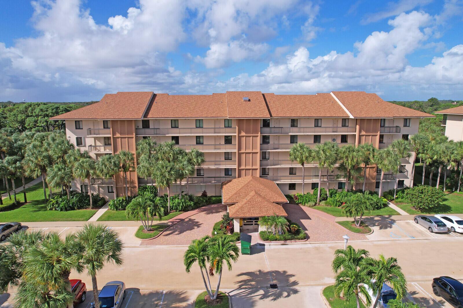 The View Never Gets Old as you sit on your back patio and watch the yachts sail by. Surrounded by Palm and Evergreen trees for delightful shade and enjoying picnics next to the Intracoastal Waterway. The location is one of the most sought after in the area.  Its proximity to the blue waters of Jupiter Beach is hard to match. Less than one mile to shopping, fine dining and parks.  Offering 2 bedrooms, 2 baths spacious living and dining area. An upgraded kitchen with breakfast bar, newer floors and other upgrades. Relax in one of the 4 community pools, play tennis or stroll around the Marina and take in the magnificent yachts. parked in the community.