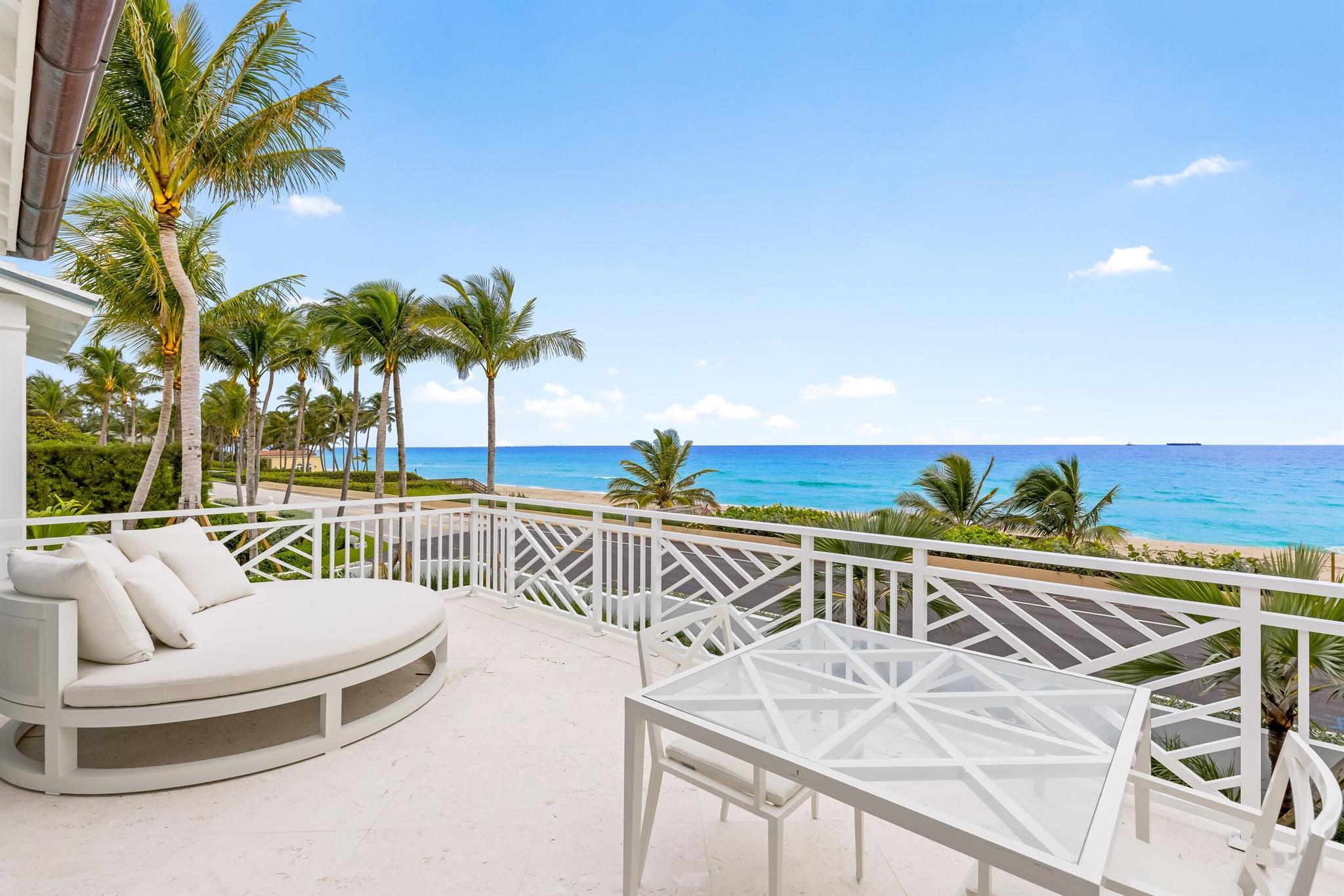 Spectacular New Construction Oceanfront estate prominently positioned on Billionaires Row with sweeping ocean views. This stunning Oceanfront compound is comprised of main house, guest house, and rare tunnel to a beach cabana. Beautiful Bermuda exterior paired with pristine transitional interiors. Highlights include 8BR/12.3BA, 16,500+/- total square feet, garages for 6 cars, generator, and fantastic outdoor living spaces. Fantastic high elevation with a full basement level with wine cellar, game room, yoga studio, and full bar. Stunning Primary Suite with morning bar, dual baths and closets, and oceanfront balcony with beautiful sunrise views. No detail has been overlooked with beautiful custom finishes and the finest craftsmanship throughout. Entry foyer leads to formal sitting room and grand stair hall. Formal dining room opens to oceanfront family room. Gourmet eat-in kitchen with top-of-the-line appliances and two islands. Game room with wet bar and fireplace. The upper floor features stunning primary suite with beautiful French doors that open to expansive oceanfront balcony that boasts breathtaking Sunrise views. Morning bar and built-in shelving. Dual walk-in closets and luxurious bathrooms with balconies. Additional upper-level guest bedrooms with beautiful en-suite bathrooms. 

Basement level features great room with bar, wine cellar, and exercise room. 

Fully equipped guest house with beautiful great room that opens to covered loggia, two guest suites on the main floor, and exercise room in the lower level. VIP guest suite on the upper floor with sitting room, walk-in closet, large bath with dual sinks, and oversized terrace.

Sprawling outdoor spaces with covered loggias, covered and open balconies, and courtyard with pool and spa that serves as a peaceful and private oasis. Additional highlights include summer kitchen, two garages with space for 6 cars, and generator. Meticulous landscaping by Environmental Design Group. Convenient access to the beach and oceanfront cabana through rare private tunnel.

Located in one of the most desirable areas of Palm Beach just minutes from Worth Avenue's renowned shopping and dining, the ever growing Downtown West Palm Beach, top-tier schools, and the Palm Beach International Airport. The home beautifully embraces the Palm Beach Island lifestyle.