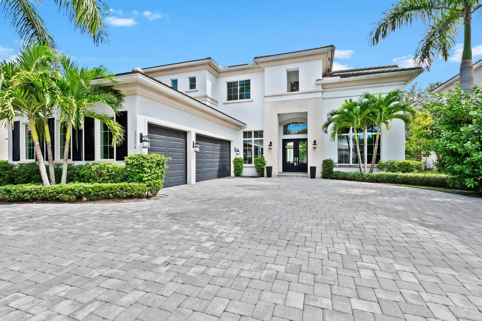 This breathtaking 5,044 SF estate home in The Oaks at Boca Raton, set on a private lot, boasts exquisite finishes throughout, including wood plank porcelain floors and wood-beamed ceilings in the kitchen and family room. Elegant light fixtures and custom built-ins enhance its beauty.Upon entering, you'll be captivated by the grand foyer, leading into a formal living room that features an electric fireplace adorned with artistic tile and large windows framing serene views of the private backyard.The first floor of this 5-bedroom, 5.5-bath home has a formal living room with fireplace, a library/office, a guest suite, a formal dining room, a gourmet kitchen with a bar, a breakfast area, a spacious family room, a powder room, a laundry room, and a mudroom conveniently located near th garage entry.

The kitchen features glossy white cabinetry, quartz countertops, glass subway tile backsplash &amp; high-end Wolf and Subzero appliances. 

Upstairs, unwind in the loft, perfect for relaxing in the evening. Three guest suites, each with en-suite bathrooms, accompany the luxurious primary suite, which includes a large shower, soaking tub, water closet, dual sinks, and a vanity. Two custom-designed closets provide ample storage, and a private balcony offers a peaceful retreat for your morning coffee.

The backyard is a tropical paradise, featuring a sparkling pool, a summer kitchen, and a swing, all surrounded by lush landscaping and hedges for added privacy.

This home also includes a whole-house generator and impact windows for added peace of mind.

Residents of The Oaks at Boca Raton enjoy exclusive access to luxurious amenities reminiscent of a prestigious country club, without the equity fees. The recently renovated 25,000 square foot clubhouse features a well-equipped fitness center, an acclaimed tennis facility, a delightful restaurant, and rejuvenating spa services. Tennis enthusiasts can indulge in 12 courts, including 10 Har-Tru, 1 Red Clay &amp; 1 Deco-Turf Hard Court. Enhanced security measures, including 24/7 rover monitoring and motion-activated infra-red cameras, provide peace of mind, distinguishing The Oaks as a premier community committed to safety.