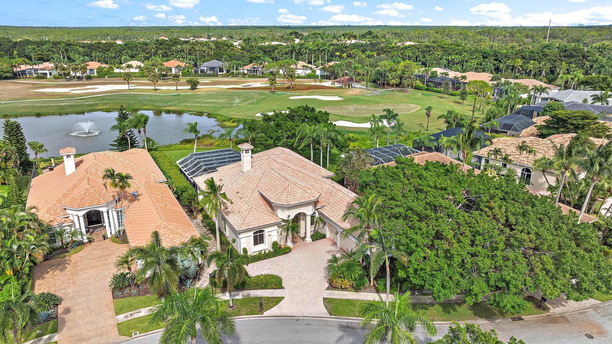 This Ecclestone Signature Home FORMER MODEL HOME boasts a premium ONE-THIRD-ACRE lot overlooking water and golf vistas of the sixth hole of Ibis's  BRAND NEW Heritage Course--reimagined and nearing completion. With 90 feet of water frontage, this home is  positioned on the oversized 90 x 190-foot lot to maximize the incredible views.  This home offers 3700 square feet and a BRAND NEW FLAT TILE ROOF (on order, to be installed imminently). Enjoy the luxury of a FULL THREE-CAR GARAGE. This estate home is neutral, loaded with extras and custom touches. The screened patio features an enormous pool, and extraordinary covered space--all overlooking serene water and golf views Ibis is famous for. It's evident that this was a model home with its extensive crown moldings, stone fireplace, stately dining room columns, coffered ceilings, beautiful fireplace, and more! Accordian Hurricane shutters (2014), custom accent lighting, custom built-ins , gorgeous leaded glass doors (2015,) and much more. The Club at Ibis is an award-winning community that boasts a 90,000 sq. ft. clubhouse, three 18-hole Nicklaus-family Championship courses, five restaurants, a world-class fitness complex, spa, and incredible tennis and pickleball facility.