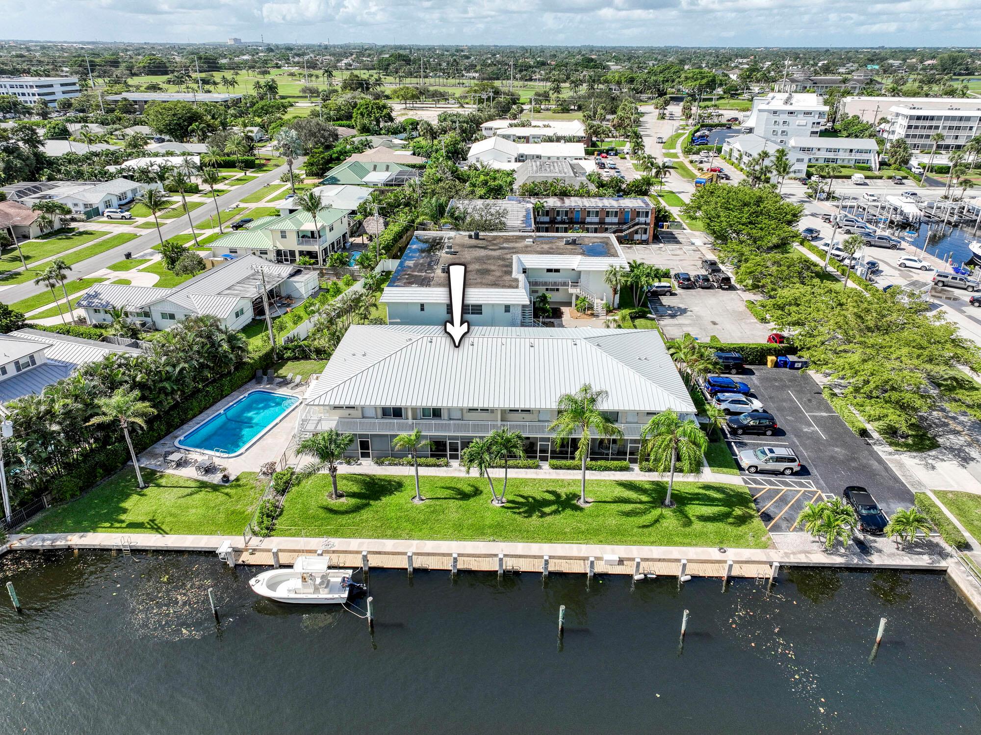 Welcome to this WATERFRONT, boutique condo of only 8 units in North Palm Beach.  This second floor, two bed, two bath condo has incredible water-front, sunrise views waiting for you.   Boat slips are available through the association when available to add convenience for the boating enthusiast.  Located on a quite cul-de-sac next to Safe Harbor Marina and walking distance to North Palm Beach County Club and local restaurants this private oasis is the perfect 55+ community.  NEW AC, Water Heater,  IMPACT Doors & Windows and building has a NEW ROOF.