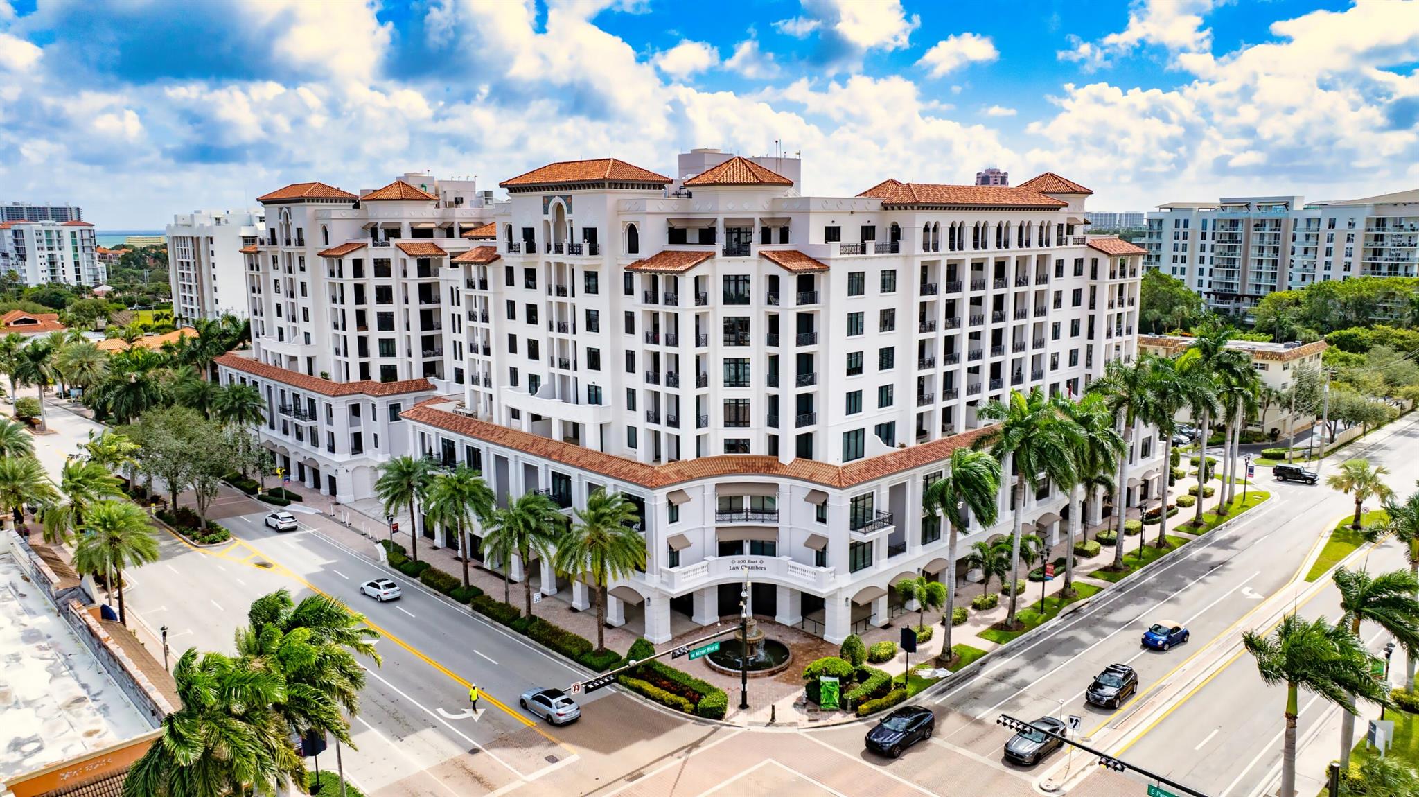 In the heart of downtown Boca Raton, less than a mile from the ocean, 200 East offers the consummate lifestyle of sophistication and luxury. This exclusive address is just blocks from the legendary resort, The Boca Raton, and 2 blocks from the world-class shopping and dining of Mizner Park, also home to the Boca Raton Museum of Art. Currently undergoing full renovations of community spaces, 200 East amenities include a well-appointed lobby, fitness center and club room, and services encompass 24-hour-attended lobby, and valet parking. 200 East is conveniently located only a 10+/--minute drive from Boca Raton's private executive airport.Residents of 200 East enjoy relaxed outdoor living around the large pool and spa set within a spectacular garden courtyard. A rare find at prestigious 200 East defined by a Florida-chic style, this stunning two-bedroom condominium residence, with 2,018 +/- living square feet plus expansive outdoor terrace, offers the ultimate intown Boca Raton lifestyle that reflects a cosmopolitan ambience blending modern luxury with classic elegance. In an open floorplan configuration, the great room and kitchen showcase a commitment to luxury and quality design. Inviting gracious entertaining and easy living, highlights include beautifully detailed custom built-in cabinetry for media, display and storage; a designer underlit floating ceiling integrating downlights; wood-slat and incised-banded styles of paneling for visual interest, texture and depth; Fry Reglet flush baseboards; pristine large-format porcelain-tile flooring; and a window-wall of glass sliding doors that open to the expansive patio terrace. A culinary delight, the gourmet kitchen is beautifully finished with sleek contemporary European cabinetry; stone counters and backsplashes; a stunning custom-designed bar-island accommodating seating; and high-end Miele appliances that include a wine fridge integrated into the cabinetry. The split-bedroom plan places the luxe primary suite separately for privacy. The bedroom is enhanced by custom cabinetry and its ensuite bathroom is fitted with dual sinks, a glass-enclosed multi-head shower, a soaking air jetted tub, and a separate water closet. The guest-bedroom suite, equally impressive, lives lavishly also, and both bedrooms are breezy and light-filled with sliding glass doors that open to the private patio terrace. Completing the layout are a laundry room and powder room, and coming with this condominium is garage-parking for two cars. Step inside this residence and make yourself at home where luxury and comfort coalesce!

DISCLAIMER: Information published or otherwise provided by the listing company and its representatives including but not limited to prices, measurements, square footages, lot sizes, calculations, statistics, and videos are deemed reliable but are not guaranteed and are subject to errors, omissions or changes without notice. All such information should be independently verified by any prospective purchaser or seller. Parties should perform their own due diligence to verify such information prior to a sale or listing. Listing company expressly disclaims any warranty or representation regarding such information. Prices published are either list price, sold price, and/or last asking price. The listing company participates in the Multiple Listing Service and IDX. The properties published as listed and sold are not necessarily exclusive to listing company and may be listed or have sold with other members of the Multiple Listing Service. Transactions where listing company represented both buyers and sellers are calculated as two sales. Some affiliations may not be applicable to certain geographic areas. If your property is currently listed with another broker, please disregard any solicitation for services. Information published or otherwise provided by seller, listing company or its representatives is deemed reliable but are not guaranteed and subject to errors, omissions, or changes without notice. Copyright 2024 by the listing company. All Rights Reserved.