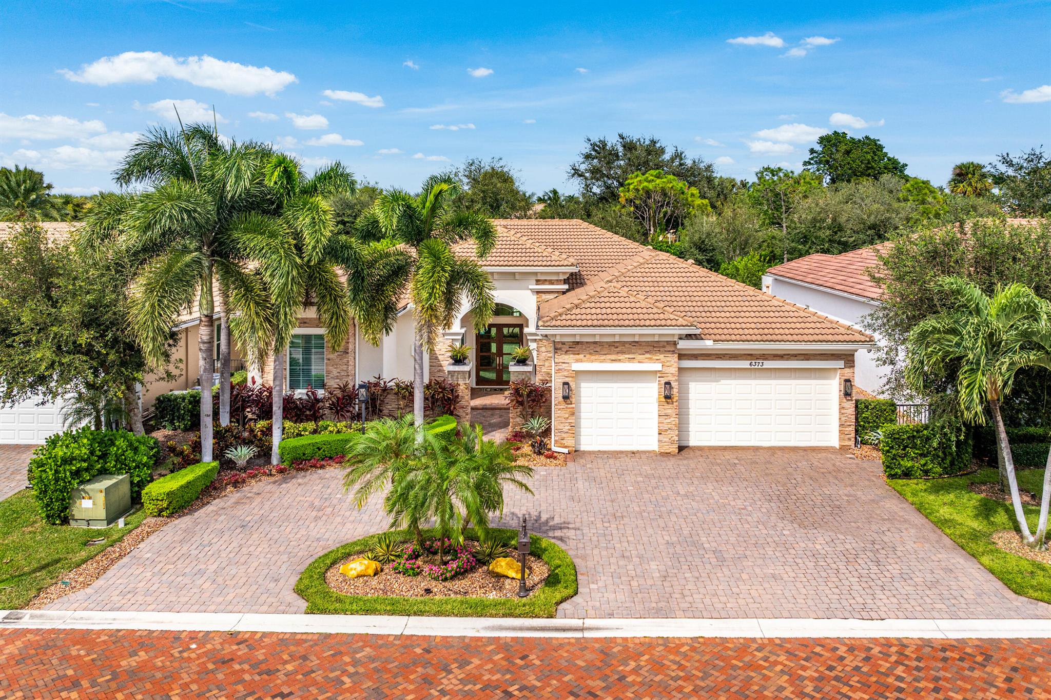 Experience luxury living in this fully renovated 4 bed 3 bath home nestled on a private lot in the Azura community located in Boca Raton. Boasting state of the art appliances this exquisite residence offers a seamless blend of style & comfort. The open-concept design features a gourmet kitchen, spacious living areas, & a primary suite with spa-like bath. A circular driveway adds elegance & convenience while lush landscaping ensures privacy. Enjoy resort-style amenities, including clubhouse, pool, &  fitness center all within minutes of world-class dining, shopping, & top-rated schools. Home Features  a  natural-gas generator, impact glass windows, new 36x72'' porcelain flooring, new Wolf appliances, new kitchen cabinets & counters, all new bathrooms, new electric/plumbing, grade 5 ceiling