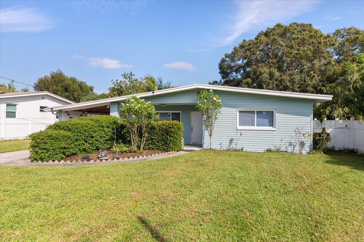 3 Bedroom, 1.5-bathroom home.  Tiled throughout. Large bedrooms.  Huge yard, workshop, Covered carport and more.  Close to shopping and downtown Fort Pierce.