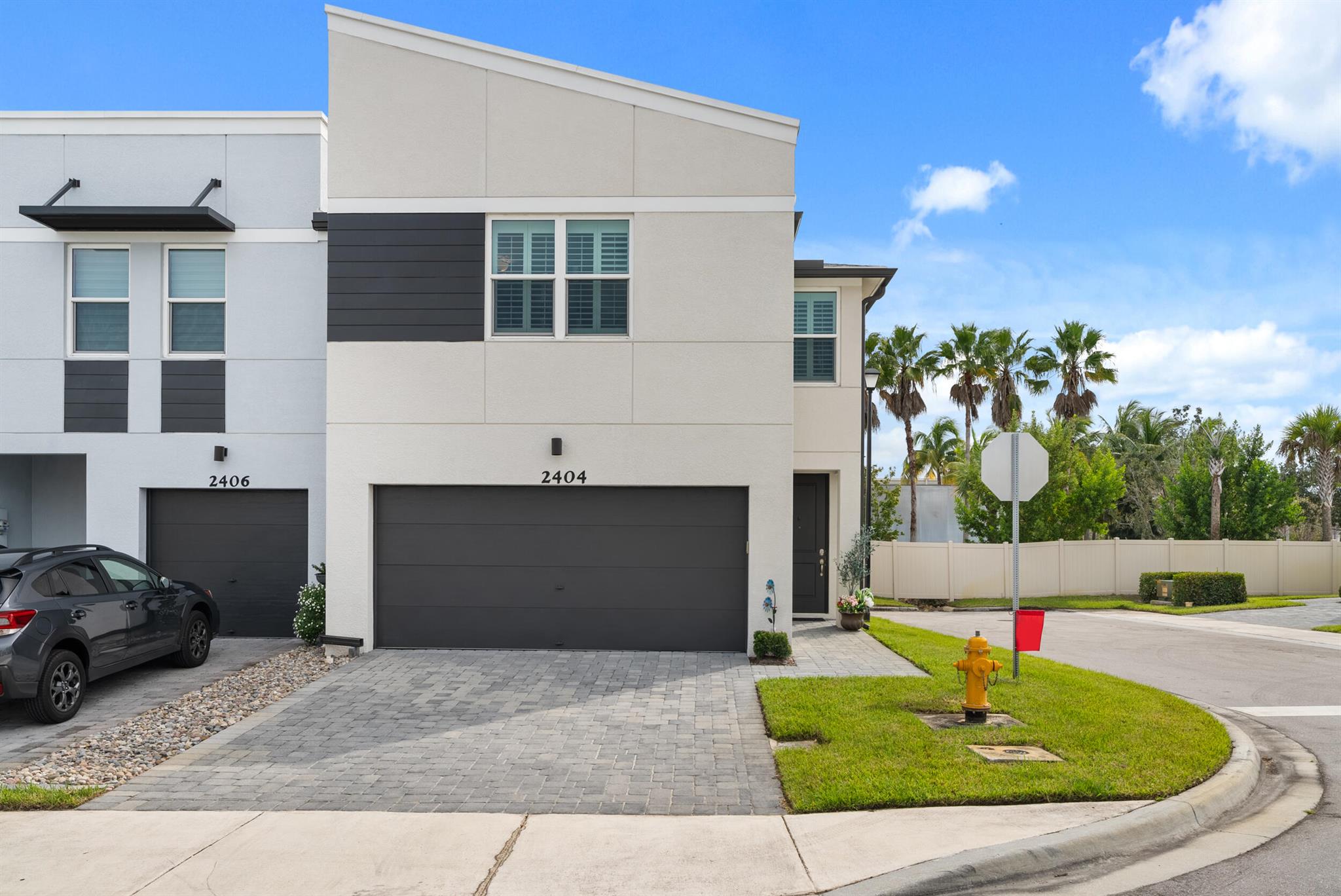 This 3bed/2.5bath, 2021 build Townhome is the epitome of Florida living! Location is King in the gated community of Trillium, mere minutes to Downtown Stuart and Martin County beaches, walking distance to endless shops and restaurants!  This bright, end-unit features complete Impact windows, quartz countertops accompanied by stainless steel appliances, a versatile loft area, and a 2-car garage.  One of the few gated communities in the area to offer a low HOA that covers exterior maintenance, landscaping, community pool, and trash removal.