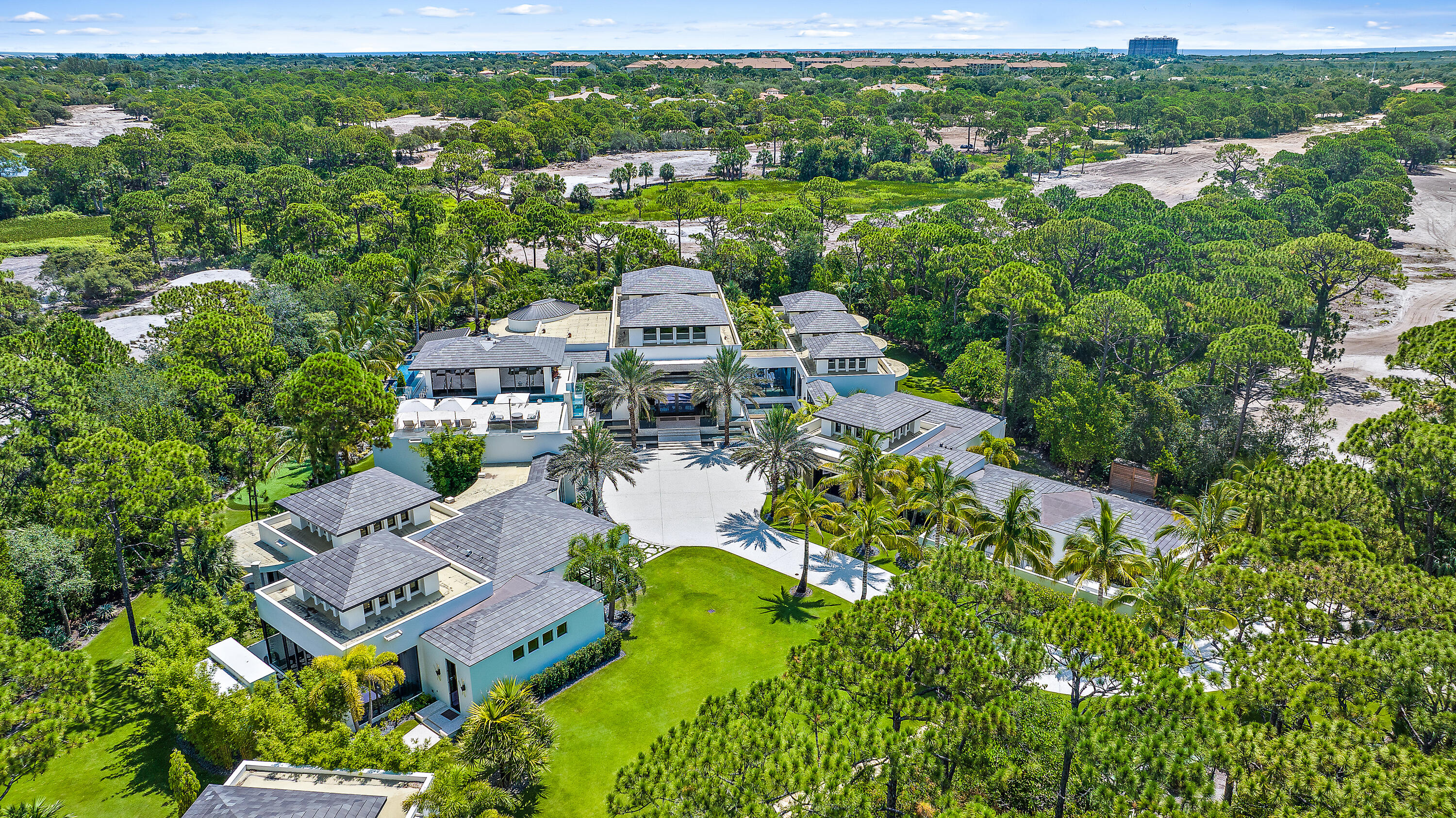 This 25,500+SF resort-style estate is privately positioned on a sprawling 2.4 acres in one of Jupiter's most sought-after communities: The Bears Club. Designed for luxurious well-being, this architectural masterpiece offers unmatched amenities in a single-family residence. Immerse yourself in the fully equipped fitness center, salon, spa, or massage room; stay on top of your game with the golf simulator; or get some reps in the 2nd level lap pool. Wind down in the meandering oasis pool with swim-up bars & cascading waterfall, regale in the game room or in one of the thoughtfully curated lounge areas. This home truly embodies the perfect blend of stunning architecture, spacious living, endless entertainment, and a rare lifestyle. 2024 POA Quarterly Assessment: $5,238; Comcast quarterly: $810. Capital Contribution is 1% of purchase price. 

DISCLAIMER: Information published or otherwise provided by the listing company and its
representatives including but not limited to prices, measurements, square footages, lot sizes,
calculations, statistics, and videos are deemed reliable but are not guaranteed and are subject to
errors, omissions or changes without notice. All such information should be independently verified by
any prospective purchaser or seller. Parties should perform their own due diligence to verify such
information prior to a sale or listing. Listing company expressly disclaims any warranty or
representation regarding such information. Prices published are either list price, sold price, and/or last
asking price. The listing company participates in the Multiple Listing Service and IDX. The properties
published as listed and sold are not necessarily exclusive to listing company and may be listed or have
sold with other members of the Multiple Listing Service. Transactions where listing company
represented both buyers and sellers are calculated as two sales. "No payments made until title passes"
Some affiliations may not be applicable to certain geographic areas. If your property is currently listed
with another broker, please disregard any solicitation for services. Information published or otherwise
provided by seller, listing company or its representatives is deemed reliable but are not guaranteed
and subject to errors, omissions, or changes without notice. Copyright 2024 by the listing company. All
Rights Reserved.