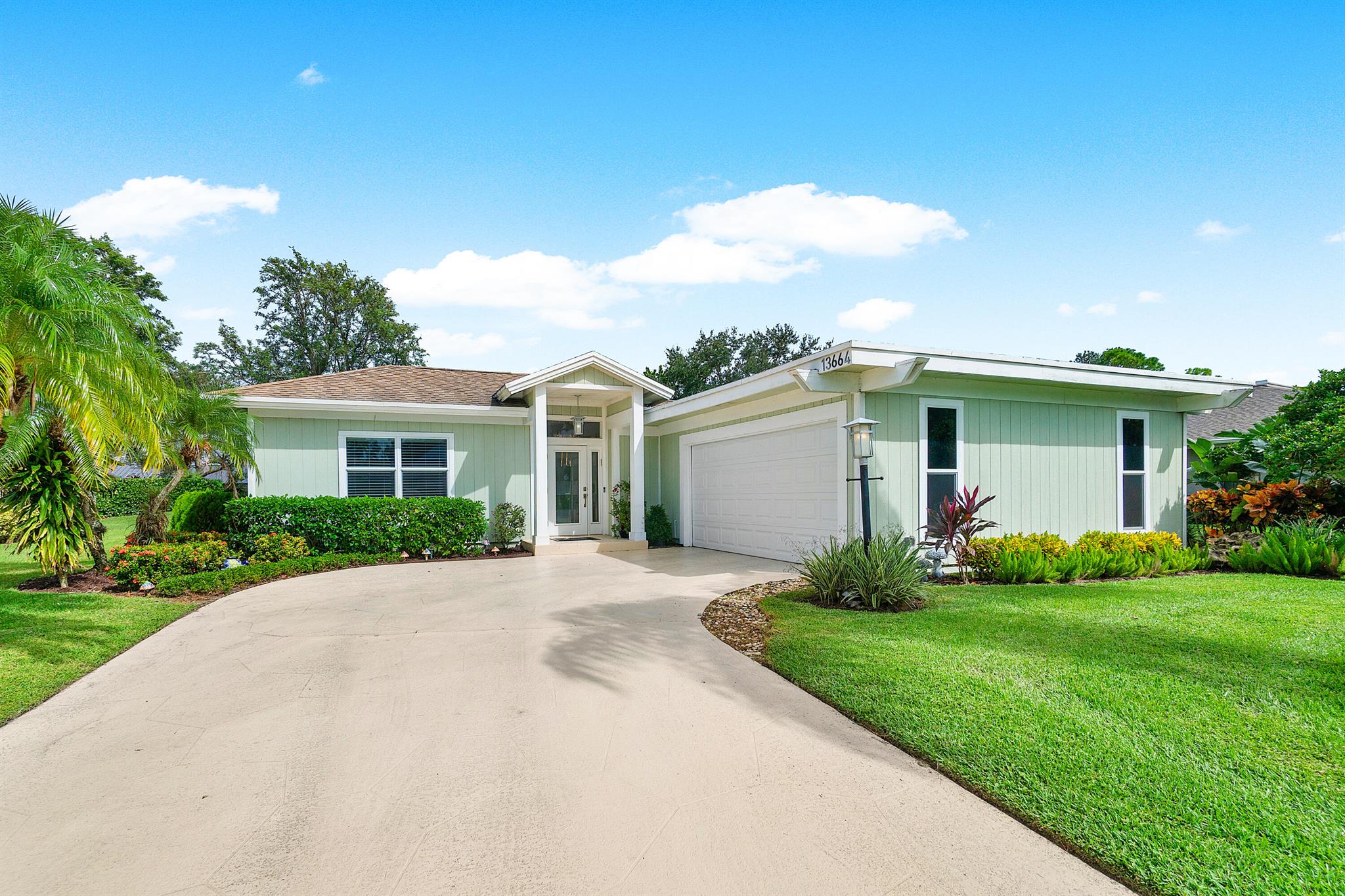 Discover modern luxury in this fully renovated 3-bedroom, 3-bath home with additional den, and formal dining, set in the sought-after Eastpointe Golf Course Community. Walking distance from the brand new clubhouse, this open-concept layout allows for seamless flow between living spaces, maximizing natural light and enhancing the home's contemporary feel. Detailed finishes like the waterfall island in the kitchen, and herring bone tile pattern in the entry can be found throughout the home. This stunning property boasts impact glass throughout, providing peace of mind and a stylish touch. With a prime location in this exclusive community, you'll enjoy both a tranquil setting and vibrant amenities. Eastpointe Country Club boasts 2 Fazio-designed golf courses, 2 clubhouses, a