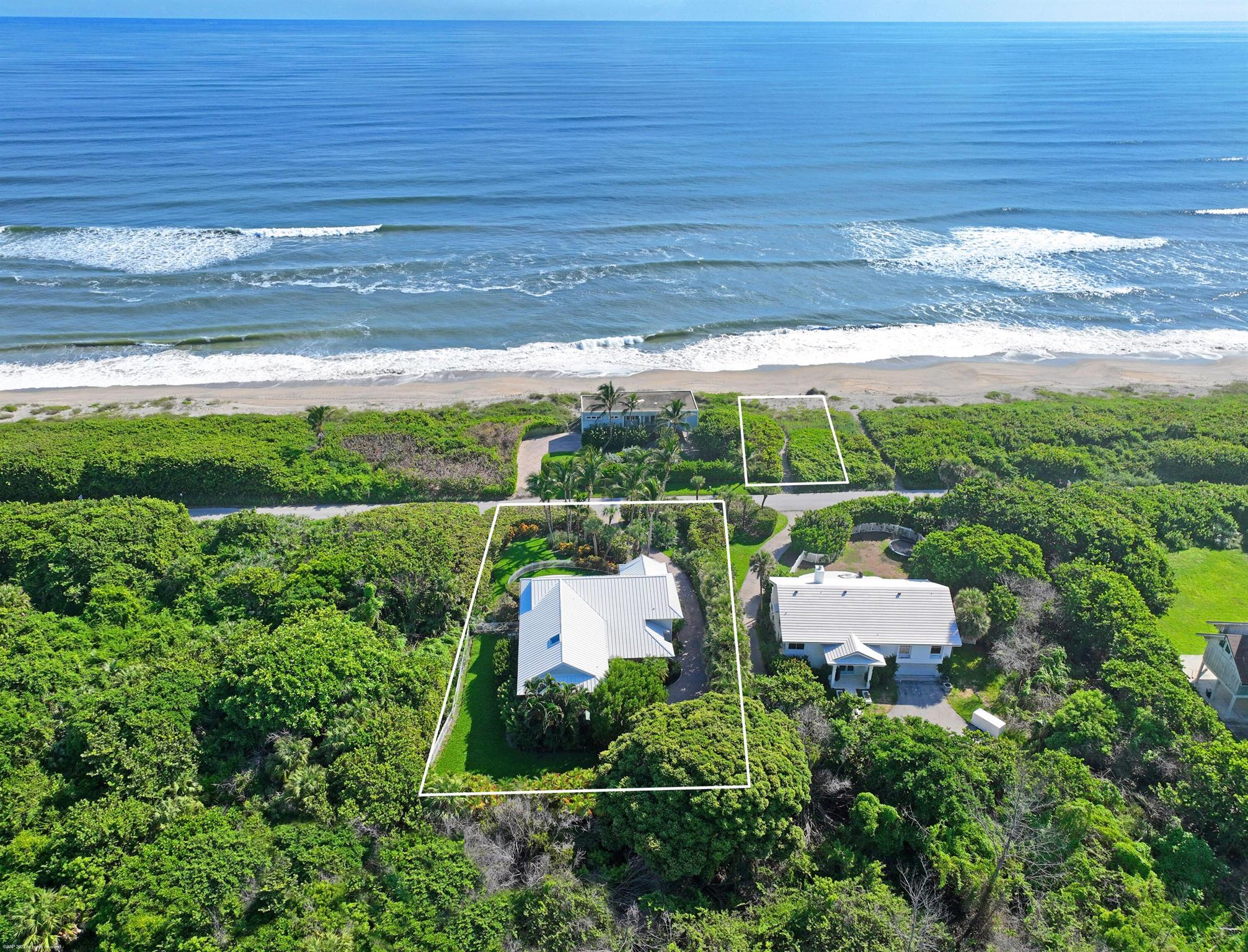 SWEEPING OCEAN VIEWS AND WARM TROPICAL BREEZES FROM THIS RECENTLY RENOVATED 4B, 3.1B HOME, PLUS A RARE DEEDED OCEAN FRONT BEACH PARCEL. ENJOY THE HEATED POOL WHILE HEARING THE OCEAN WAVES LAP THE SANDY SHORE LINE. GENEROUS UPPER LEVEL WRAP AROUND DECK PROVIDES AMPLE ROOM FOR GRILLING, ENTERTAINING AND OUTDOOR DINING. HOME FEATURES ALL NEW IMPACT WINDOWS AND DOORS, METAL STANDING SEAM ROOF (2017), & ELEVATOR, NEWLY REMODELED KITCHEN WITH THERMADOR GAS STOVE AND CONVECTION OVEN, SEPARATE F. BERTAZZONI ELECTRIC CONVECTION WALL OVEN, SUB ZERO SIDE BY SIDE STAINLESS FRIDGE/FREEZER, LARGE CENTER KITCHEN ISLAND. GROUND FLOOR FEATURES SEPARATE 2 BEDROOMS PLUS FAMILY ROOM FOR FAMILY OR GUESTS OVERLOOKING THE POOL. HVAC HAS TWO ZONES FOR EVERYONE'S COMFORT. LAUNDRY ROOM EQUIPPED WITH SPEED QUEEN CLOTHES WASHER, DRYER AND STAINLESS VIKING FRIDGE/FREEZER, DINING AREA BUILT IN CHINA AND GLASS WALL CABINETS, BAR TOP WITH STAINLESS WINE COOLER, VOLUME CEILING FANS IN DINING/LIVING AREA, ELECTRIC FIREPLACE. YARD AND POOL COMPLETELY FENCED, OUTDOOR SHOWER, GAS &amp; ELECTRIC POOL HEATERS. PAVER DRIVEWAY, FULL ZONED IRRIGATION SYSTEM, LUSH MATURE TROPICAL LANDSCAPING WITH BEAUTIFUL PALM TREES. LOCATED NEXT TO HOBE SOUND WILDLIFE REFUGE THIS HOME OFFERS UNPARALLELED  PRIVACY AND  NATURAL SURROUNDINGS, YET JUST MINUTES FROM SHOPPING, RESTAURANTS, AND LOCAL AIRPORT. PRIVATE DEEDED 50' x 75' BEACH FRONT PARCEL FOR BEACH AND OCEAN ACCESS COMPLETE THIS INCREDIBLE COMPOUND.