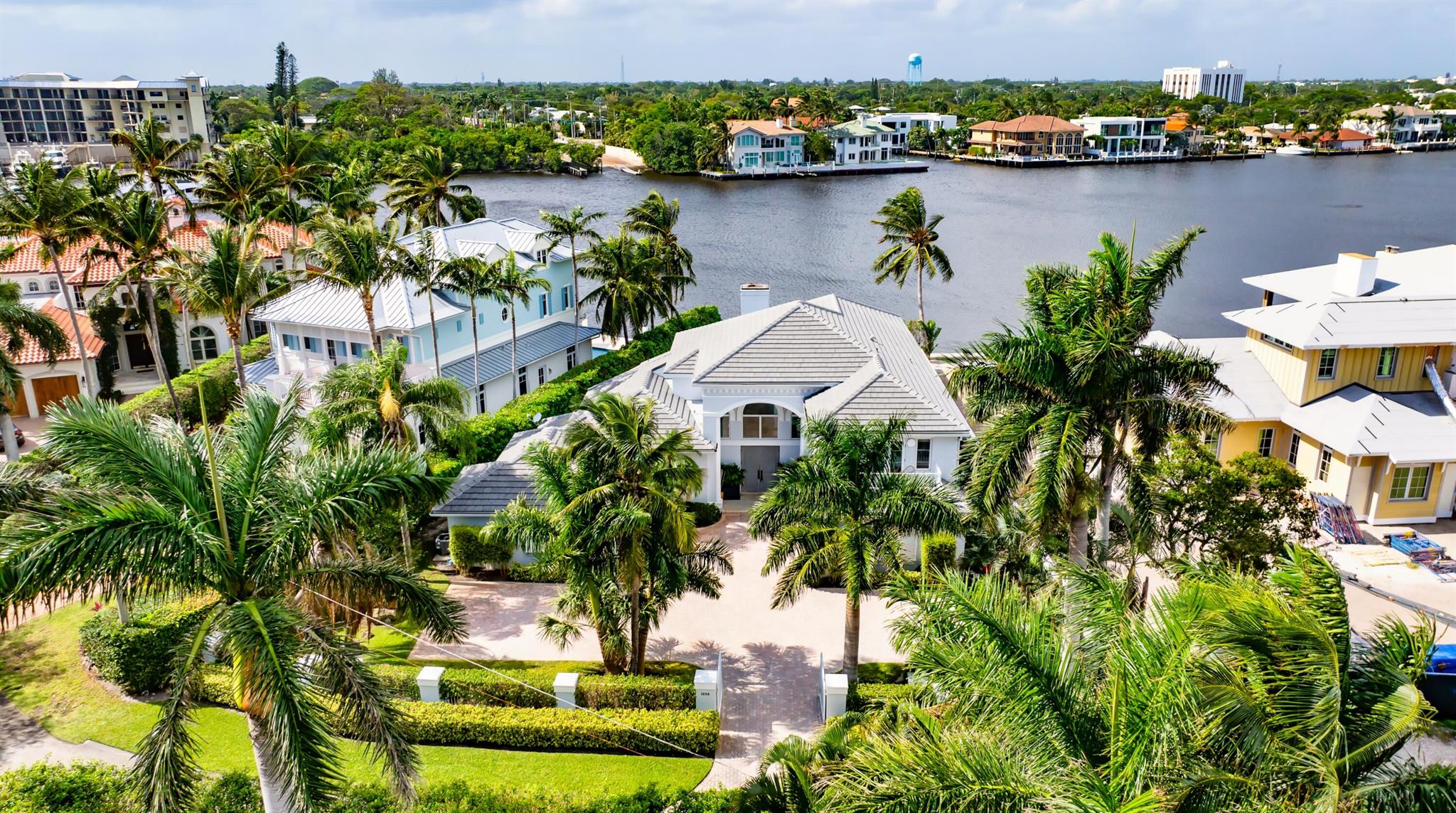 This luxe Seagate estate, with 50 feet fronting the Intracoastal, features beautifully appointed interiors that integrate seamlessly with the outdoor entertaining area, where the loggia overlooks the pool and dock. Newly installed wide-planks wood floors flow throughout, while the meticulously renovated kitchen and bathrooms elevate this stunning residence to the pinnacle of South Florida living DISCLAIMER: Information published or otherwise provided by the listing company and its representatives including but not limited to prices, measurements, square footages, lot sizes, calculations, statistics, and videos are deemed reliable but are not guaranteed and are subject to errors, omissions or changes without notice. All such information should be independently verified by any prospective purchaser or seller. Parties should perform their own due diligence to verify such information prior to a sale or listing. Listing company expressly disclaims any warranty or representation regarding such information. Prices published are either list price, sold price, and/or last asking price. The listing company participates in the Multiple Listing Service and IDX. The properties published as listed and sold are not necessarily exclusive to listing company and may be listed or have sold with other members of the Multiple Listing Service. Transactions where listing company represented both buyers and sellers are calculated as two sales. "No payments made until title passes" Some affiliations may not be applicable to certain geographic areas. If your property is currently listed with another broker, please disregard any solicitation for services. Information published or otherwise provided by seller, listing company or its representatives is deemed reliable but are not guaranteed and subject to errors, omissions, or changes without notice. Copyright 2024 by the listing company. All Rights Reserved.