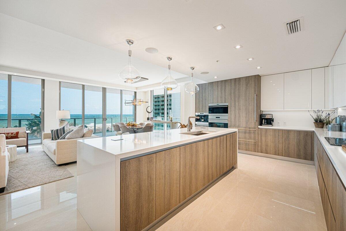 Enjoy oceanfront sunrises and sunsets over the intracoastal from this 2 bedroom + den floor- through residence designed by Bob Martin of Decorators Unlimited. The former model, 605 offers 900SF of outdoor space on two wraparound terraces, and features considerable upgrades including custom cabinetry, built-ins throughout, Wolf & Sub-Zero appliances, JL Closets, smart home automation, and can be offered turnkey for your Palm Beach stay this season! Amrit is Palm Beach's premier resort-style development with unparalleled wellness amenities, as well as four on-site restaurants. Enjoy the conveniences of condo living, with the amenities of a luxury hotel including valet parking, beach service, room service, resort-style pools, concierge and access to a 100,000+ SF spa & wellness facility.