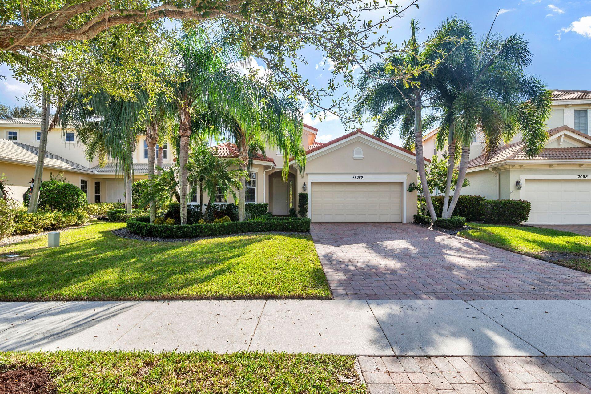 Welcome to 12089 Aviles Circle. This desirable one level FLORESTA Model with serene landscaping and pond views is located in the prestigious gated Paloma community of Palm BeachGardens. Built in 2010, you will enjoy the open concept plan of this beautifully maintained CBS construction, 3BR, 2.5 bath, 2 car garage home with impact glass throughout, high ceilings, gourmet kitchenwith stainless steel appliances, granite counters, and the sanctuary of the luxurious primary bedroom suite overlooking the covered lanai.  Paloma's amenities include a large community swimming pool,clubhouse, fitness center, kids playground and on-site manager. It is centrally located to the finest restaurants, shopping, beaches, world class golf and Palm Beach International Airport.