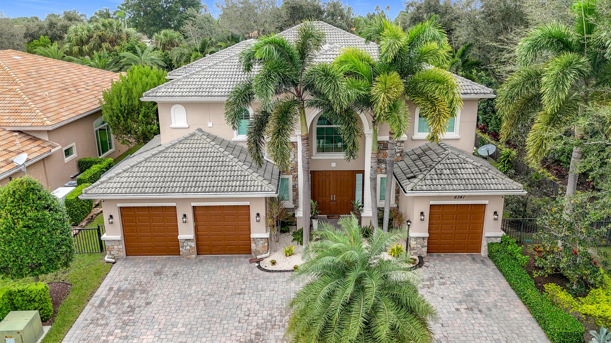 Welcome to 6341 Montesito St, located in the Prestigeous gated community of Azura in central Boca Raton. This home is set on a premium corner lot with no through traffic offering exceptional privacy in Boca Raton's best school district. Step inside to find soaring ceilings and an abundance of natural light throughout, creating a bright and welcoming atmosphere. The Chefs kitchen, equipped with high end appliances and plenty of counter space flows seamlessly into the spacious living areas perfect for both daily living and entertaining. The expansive master bedroom is a true retreat with large closets and a private balcony with pool views and lush landscaping. This extraordinary home combines luxury, privacy, and an ideal location offering the best of Boca Raton living!