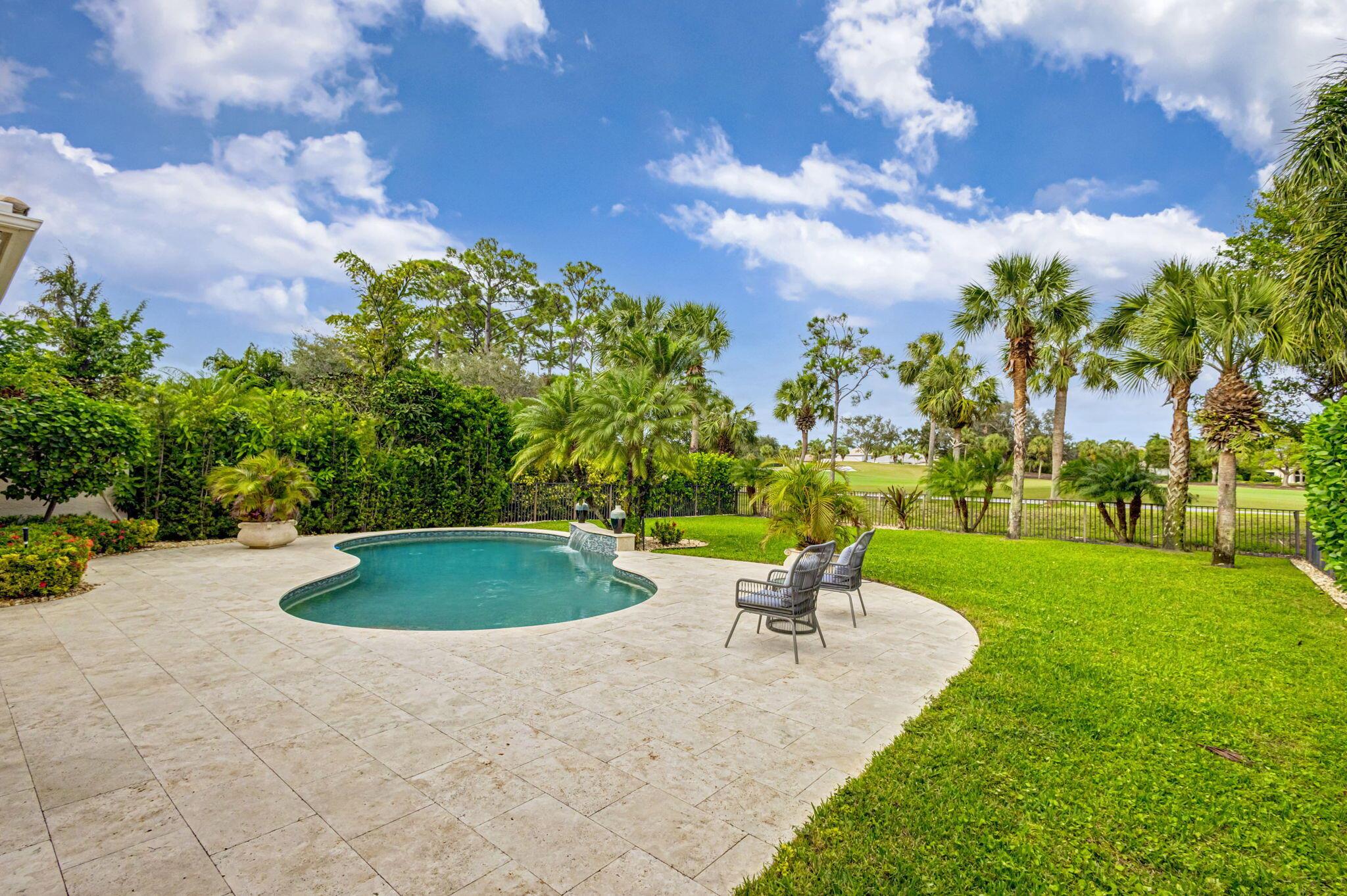 A Rare GOLF Membership in Mirasol Country Club with this modern renovated home offering quality finishes, spacious patio and private yard.  This magnificent residence is 4,228 square feet of living space with four VIP bedroom suites plus a spacious office. This welcoming home will captivate you with its magnificent backyard and peaceful views of the Golf course . The kitchen is a chef enthusiast's dream, featuring top-of-the-line appliances, oversized quartzite countertops and beautiful cabinetry. The primary suite with double doors offers a tranquil getaway with views of lush tropical landscaping. The large office is a great space for productivity, situated for privacy. The First-floor guest VIP suite is spacious and has plenty of privacy. The 2nd level has two VIP bedroom suites with a loft. The open floor plan is designed for comfortable living, with plenty of windows allowing an abundance of natural light. Entertain with friends and family on the oversized patio, and yard which includes a freeform pool, summer kitchen, perfect to enjoy the tropical lifestyle year-round.
Additional features of this renovated home include, updated flooring, light fixtures, front entry doors, all bedrooms and bathrooms updated, closet built-ins, window treatments, outdoor remote control patio screen, summer kitchen, patio pavers, pool tiles, new AC for the 2nd level, ceiling fans and much more. A two-car garage, separate Golf cart garage, hurricane windows and accordion shutters complete this wonderful residence. A Rare Golf membership is available, providing the resident with access to the world-class amenities and lifestyle at Mirasol Country Club  one of Palm Beach Gardens' most coveted country clubs. Boasting a 75,000 square foot clubhouse with multiple indoor and outdoor dining venues, a full-service spa, a state-of-the-art fitness center, a dedicated kids' clubhouse, tennis and pickleball courts, an Olympic-sized pool, kids pool, additional secluded pool and two championship golf courses. This vibrant community offers an array of social activities, special interest clubs and events, ensuring a dynamic lifestyle for its residents.