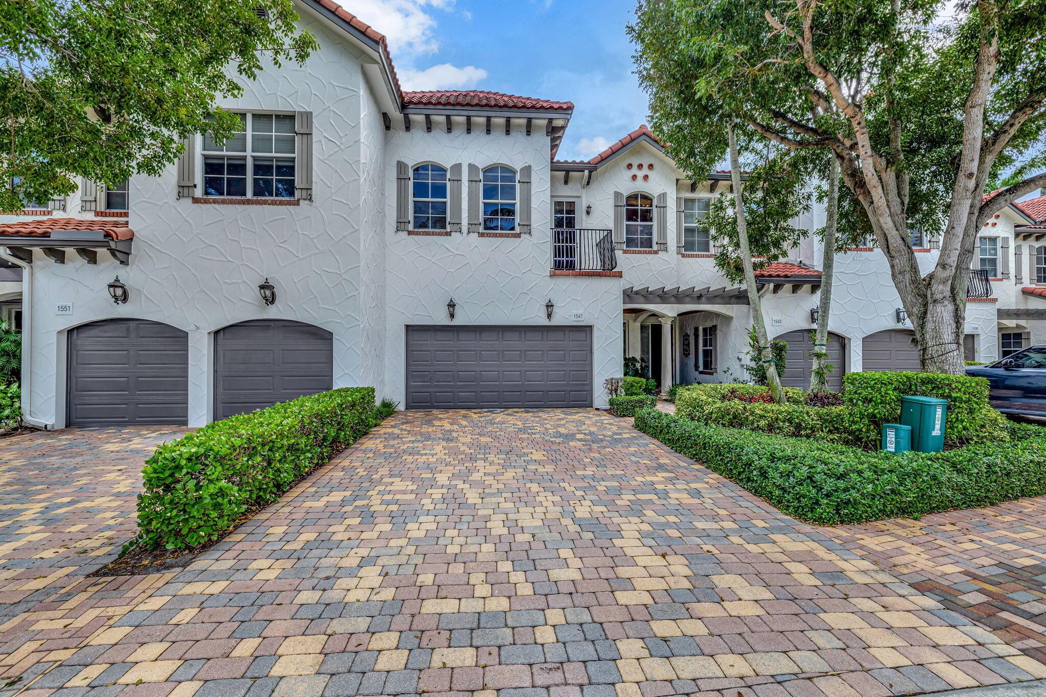 Pristine Condition.  Stunning waterfront townhouse located in The Estuary, a gated Intracoastal community, just minutes from the beach and downtown Atlantic Avenue.  This two-story, Magellan model has 3-bedrooms, 3.5 bathrooms and 2,884 sf of living space.  The second floor includes a large master bedroom with balcony, his/her bathrooms and walk-in closets.  The chef's kitchen features granite countertops, high-end appliances (Sub-zero refrigerator) built-in cabinetry and dining area.  Recent renovations include:  brand new elevator, new kitchen appliances.  Roof installed in 2018 with 10 yr warranty.  The spacious living area has beautiful french oak floors and opens onto a covered patio with spectacular views of the lake and Intracoastal.