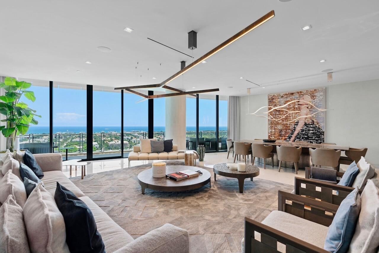 MODERN MASTERPIECE -- a truly elevated living experience. Meticulously redesigned by Solesdi Design with high-end Italian furnishings by Henge & Rimadesio. PARKING for 4 VEHICLES. 5,166 Total SF, including two expansive terraces with breathtaking views of the ocean and Intracoastal. The primary suite is a sanctuary of luxury, boasting dual bathrooms and dressing rooms for added convenience and privacy. Motorized shades throughout (including blackout shades) the residence provide effortless control over natural light, and the 11-foot sliders seamlessly connect indoor and outdoor living spaces.The Bristol offers a truly exceptional lifestyle, including the most impressive 5-star amenities and special attention to detail including... on-site professional concierge, two spas, beauty salon, waterfront fitness center, 75-ft resort-style swimming pool, club lounge and dog park. Three house vehicles equipped with a driver, gated entrance, and 24-hour valet and front desk. The finishes throughout are a testament to the property's unparalleled quality. Specialty marbles, high-end wood, and metal elements adorn the space, while the walls feature a stunning cement finish applied with seven coats, reminiscent of Venetian plaster. The attention to detail is evident in every corner, from the sleek electrical receptors by Bocci to the Salvatori Italian Marble walls in the entrance foyer and powder room. The gourmet kitchen is a culinary enthusiast's dream, featuring top-of-the-line Gaggenau appliances, including a gas stove top and induction cooktop, two dishwashers, ovens, and even an espresso machine. The Snaidero Italian cabinetry adds a touch of elegance, while the Subzero wine fridge, capable of storing up to 100 bottles, and refrigerator drawers cater to all your storage needs. Included in the luxurious interior are top of the line systems like Crestron, Sonos, and Sonance A/V systems. 1 assigned parking spot and 3 Valet spaces/spots. 1 storage. ALL Furnishings, Artwork, Italian Linens, Pillows, Throws, Decor, Accessories are sold separately.