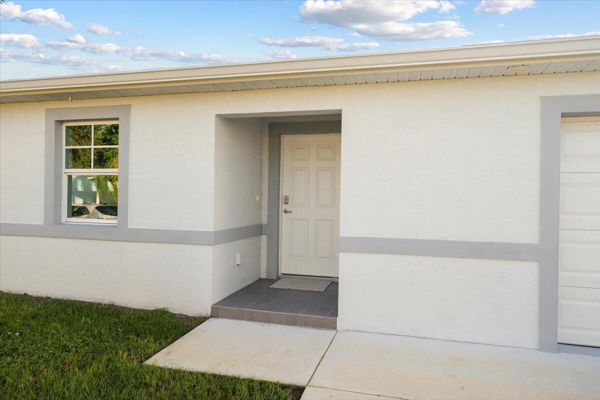 This 1 bedroom home with a den is as cute as they come located in Spanish Lakes (55+ community). Flooring is waiting for you to select, as are the appliances. Located in the front of the community and close to the club house. If you are looking for be out of the cold weather this season and ready to enjoy our beautiful Florida winter then you do not want to miss this! Metal roof, hurricane impact windows, granite counters, tile through main area, tankless water heater, and so much more. Private golf course ( no fees to play,) 2 pools, pickleball, tennis, shuffleboard, bocce, gym, library, cards, Mah jong, bible study, wood workshop, golf cart parades, dinners, dances, trips and so much more! Grass cutting is also included as is trash removal. Seller financing available at 5% interest!