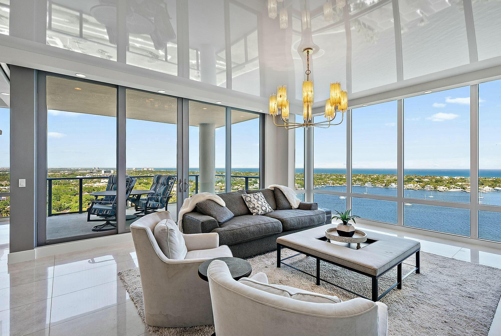 Welcome to Water Club North Palm Beach, where luxury living meets breathtaking water views. This meticulously designed 3-bedroom, 3.5-bathroom condo on the 21st floor of the prestigious Tower 1 offers nearly 3,000 square feet of exquisite living space. With expansive, unobstructed views of the Intracoastal Waterway and Atlantic Ocean, this home delivers a truly elevated lifestyle.As you enter the residence, you'll be greeted by an open and airy floor plan that combines elegant design with modern convenience. The spacious living and dining areas feature floor-to-ceiling windows that allow natural light to flood the space, showcasing the stunning water vistas. High-end finishes, such as large tile flooring throughout, designer lighting, and custom window treatments, enhance the luxury feel.

The gourmet kitchen is a chef's dream, featuring top-of-the-line appliances, sleek quartz countertops, and a large center island perfect for both meal prep and entertaining. The kitchen flows seamlessly into the living and dining areas, making it ideal for hosting guests or enjoying quiet nights at home.

The master suite is a private oasis with expansive water views, a spacious walk-in closet, and a luxurious ensuite bathroom. The bathroom boasts a dual vanity, soaking tub, and a glass-enclosed rain shower, creating a spa-like experience. The second and third bedrooms are equally impressive, offering ample space and an en-suite bathrooms.

Water Club North Palm Beach is known for its first-class amenities, which include a state-of-the-art fitness center, resort-style pool, hot tub, spa, and 24-hour concierge service. The building also features a private marina with direct access to the Intracoastal, ideal for boating enthusiasts.

Located in the heart of North Palm Beach, this home is just minutes from world-class shopping, dining, and entertainment at The Gardens Mall, Palm Beach Gardens, Palm Beach Island, and the vibrant Downtown West Palm Beach. Additionally, you're within easy reach of pristine beaches and championship golf courses, making this an ideal destination for those seeking both relaxation and adventure.

Don't miss the opportunity to own this spectacular residence at Water Club North Palm Beach. Schedule your private showing today!