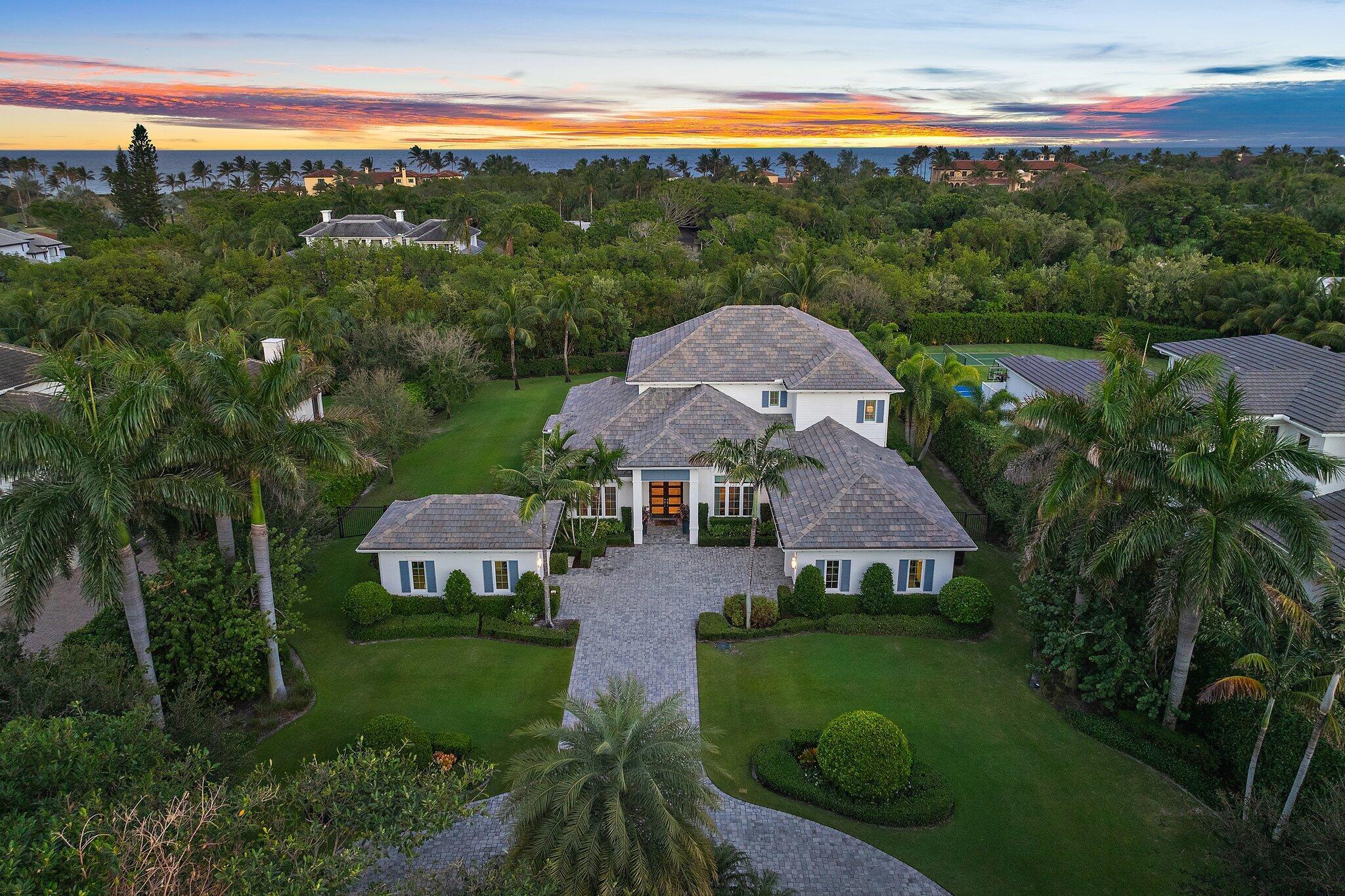 This is the one!  Being offered fully furnished, this stunning property in a premier private location, on an acre of property with designer finishes, is priced to sell.  A spectacular home that offers the pinnacle of Florida living with every modern amenity.  Built in 2016 and offering 6,550 total square feet, five bedrooms, five full and one-half baths. Sun lit rooms flow easily to a tropical outdoor paradise complete with summer kitchen with a covered dining area.  An oversized pool and jacuzzi with sun shelf accommodate all types of fun in the sun and are located just steps to the large fire pit.  Manicured grounds and expansive entertaining space accommodate every possible option from family barbeque to a cocktail party for 50. Natural Light and designer finishes welcome you as you enter this beautiful space.  Featuring an open floor plan that enhances views of the pool and manicured grounds.  Moving through the large great room, kitchen and breakfast area, you are surrounded by contemporary elegance that is second to none. A formal dining room with adjacent bar and wine closet are just some of the features this special home offers.
Complete with five bedrooms, five and -+ baths as well as a spacious office, there is room for family and friends alike.  Located on the first-floor the primary bedroom overlooks sumptuous gardens and the sparkling pool.  Featuring a large walk-in closet and spa like bath. His and Her vanity's, soaking tub and oversized shower offer the perfect place to unwind and refresh. A second bedroom with en-suite bath located on the first floor provides options that will accommodate every family need.  Three additional en-suite bedrooms located on the second level round out the bedroom space.
Also located on the second level is an impressive 28' by 24' Club Room.  Equipped with a large wet bar with refrigerator drawer, early morning coffee or a nightcap is a breeze for your guests or family members.  This space is perfect for game night, sleep overs for the kids or a secluded place to read a book while enjoying a cool ocean breeze on the covered patio.  
Technology is the hallmark of this home. A Control4 platform is the operating system for the entire home. Managing the entertainment system, air conditioning, garage doors all from your mobile device offers security and peace of mind. In addition to full impact rated windows and doors, Armor Screens provide hurricane protection for the lanai and summer kitchen as an additional layer of security. A 22 KW Generator and 1,000-gallon buried propane tank are also on site. Garage space for 3 vehicles complete the picture.