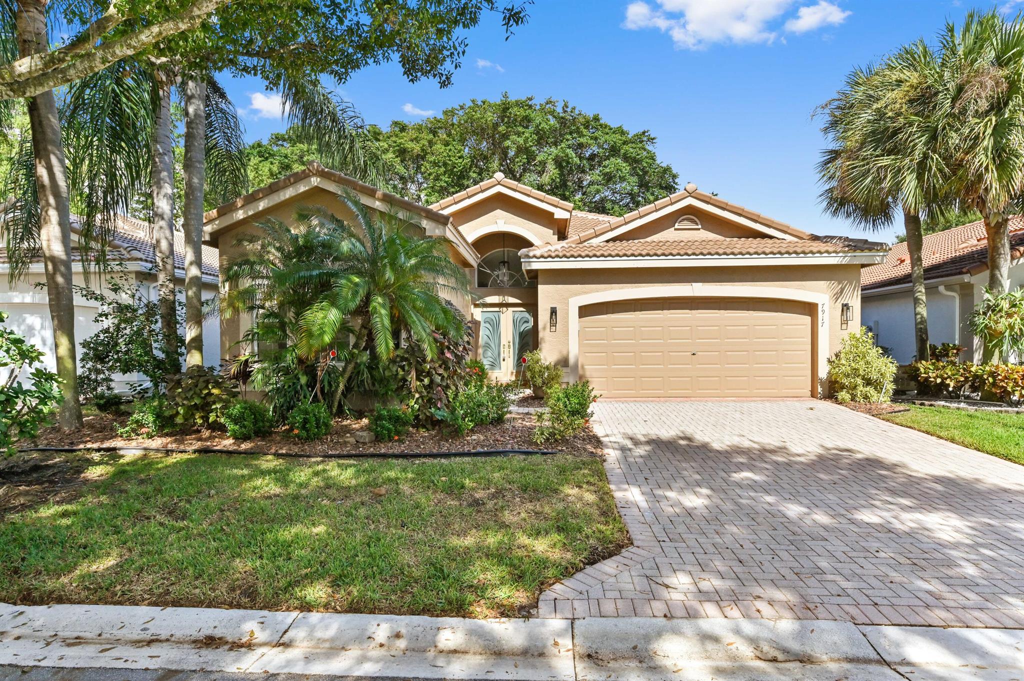 NEW ROOF 2024A/C 2020HWH 2019We're introducing 7917 Stanza Street, a beautifully crafted residence in the vibrant, active adult community of Valencia Lake, Boynton Beach, FL community. As you arrive, you're welcomed by stunning landscaping that sets an elegant tone. The charm of this home is evident from the spacious foyer, showcasing meticulous attention to detail.The spacious living areas are ideal for both memorable gatherings and peaceful relaxation. The stunning kitchen, designed for culinary enthusiasts, features modern stainless-steel appliances, state-of-the-art cabinetry, granite countertops, and plenty of counter space, including a double sink. This inspiring space is perfect for preparing gourmet meals! Step outside to a beautifully maintained outdoor oasis, ideal for enjoying Florida's weather on the covered and uncovered patio. Nearby community green spaces offer a tranquil escape.

Additional highlights include a two-car attached garage, enhancing convenience. 

Located in Boynton Beach, 7917 Stanza Street is truly a masterpiece for those who appreciate elegance. Enjoy proximity to popular dining, shopping, and recreational options, with the beach just a short drive away!

Embrace a life of inspiration in this exceptional home and take pride in owning this delightful gem in the sought-after Boynton Beach community. Seize the opportunity to invest in a lifestyle of comfort and luxury.


Valencia Lakes presents a location that epitomizes convenience. It is in proximity to the best shopping, dining, and recreation that Boynton Beach has to offer. It also houses a collection of amenities designed for entertainment and wellness. These include a clubhouse for community activities, a fitness studio to keep up with your health goals, pickleball and tennis courts for sports enthusiasts, and a spa for a much-needed tranquil retreat. Furthermore, an on-site manager ensures smooth community living.