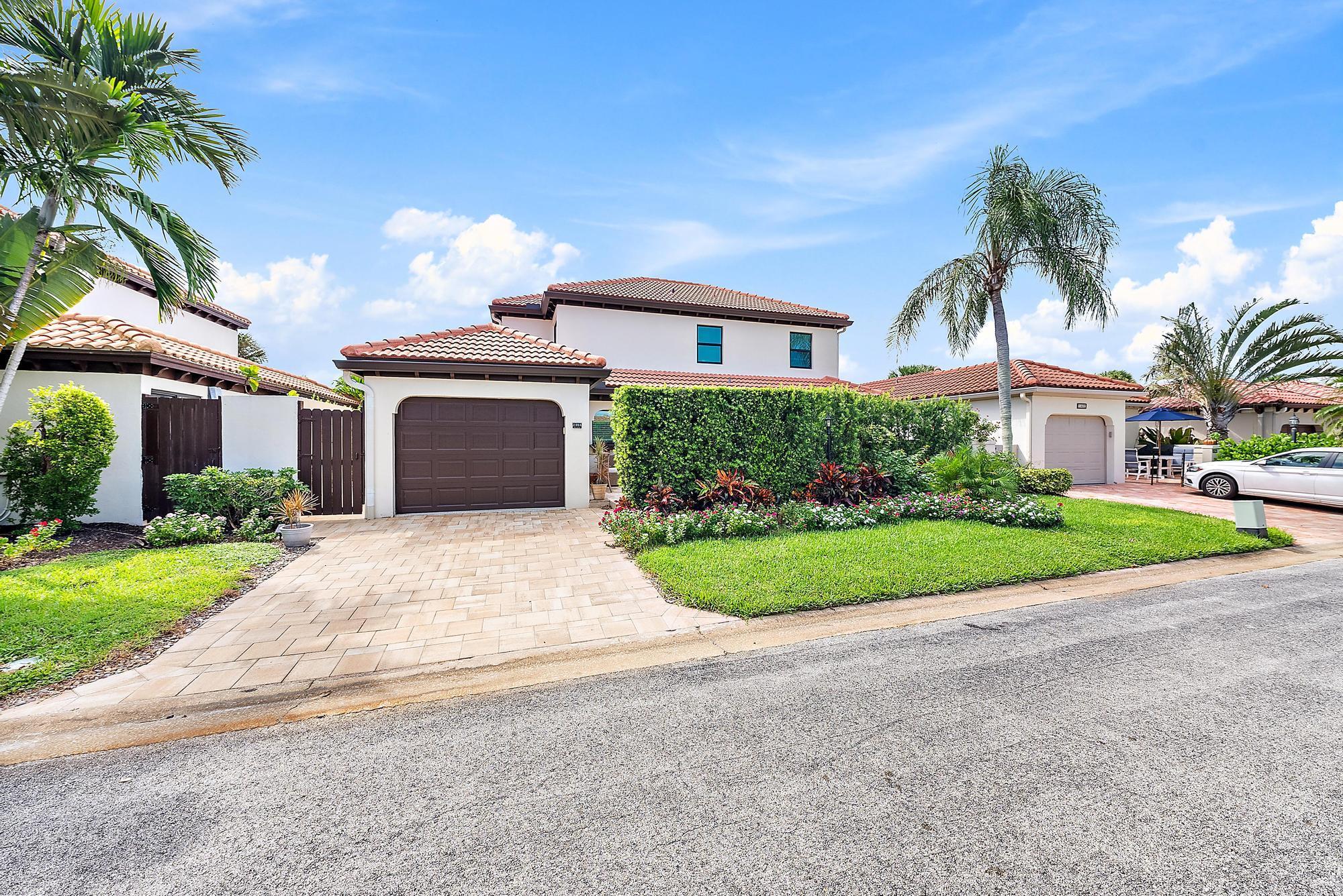 Just a block from the beach. Beautifully upgraded home featuring a 2022 roof, AC, and mini-split system. Enjoy the convenience of a power awning, plantation shutters, and power blinds. Recent upgrades include interior doors, hardware, front door, kitchen add-on with sidebar fridge, new gutters, and downspouts. The garage boasts a finished floor and attic stairs, while the exterior shines with fresh paint, new lighting, and landscape lights. Perfect for entertaining, the outdoor space includes a grill and fridge. Full impact glass, hurricane-rated roof, and wind mitigation report available. Plus, enjoy a beautiful outdoor shower. AC Airduct was all replaced 2024. Low HOA!