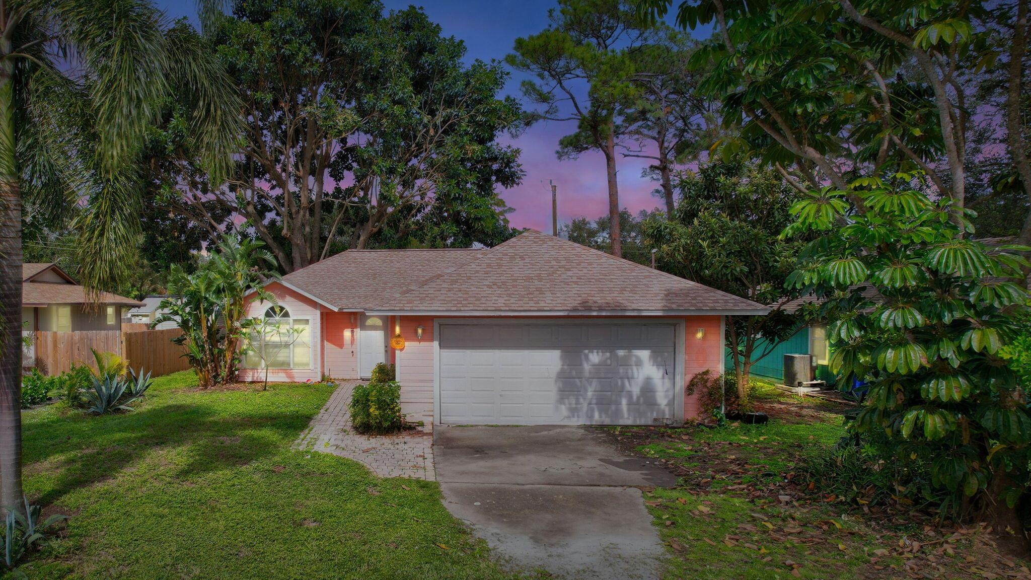 Welcome to this charming 2-bedroom, 2-bathroom home that beautifully combines comfort and convenience! This home features a brand new roof installed in 2021, giving you peace of mind for years to come. Step outside into your private, fenced-in yard, perfect for pets and entertaining. The screened-in patio offers a relaxing space to enjoy your morning coffee or unwind in the evening, with plenty of room to add a pool for that perfect backyard oasis. This home is ideal for those seeking a cozy retreat with easy access to everything you need. Don't miss the opportunity to make this your new home!