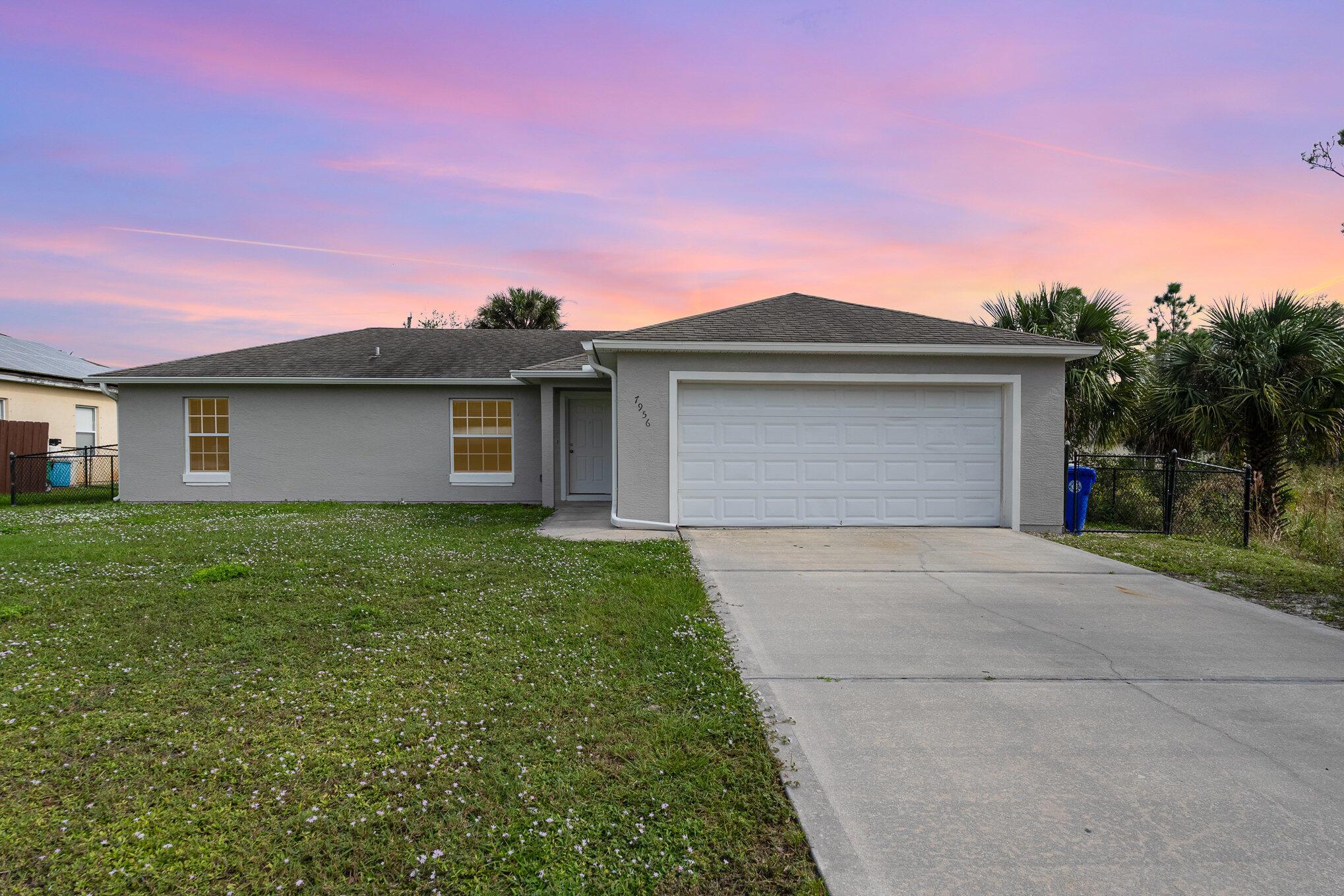 Welcome to 7956 102nd Ave in Vero Beach! This beautifully updated home features modern tile and vinyl flooring throughout, along with a fully renovated kitchen boasting sleek granite countertops and stainless steel appliances. Enjoy the spacious backyard, perfect for outdoor relaxation, gatherings, and play. Located just minutes from local shopping and dining options, this home is conveniently close to the vibrant Vero Beach Outlets and various parks for outdoor activities. Plus, the nearest beach is only about a 20-minute drive away, giving you easy access to the beautiful Florida coastline for sunbathing, swimming, and sunset strolls. Don't miss this move-in-ready gem in a prime location!