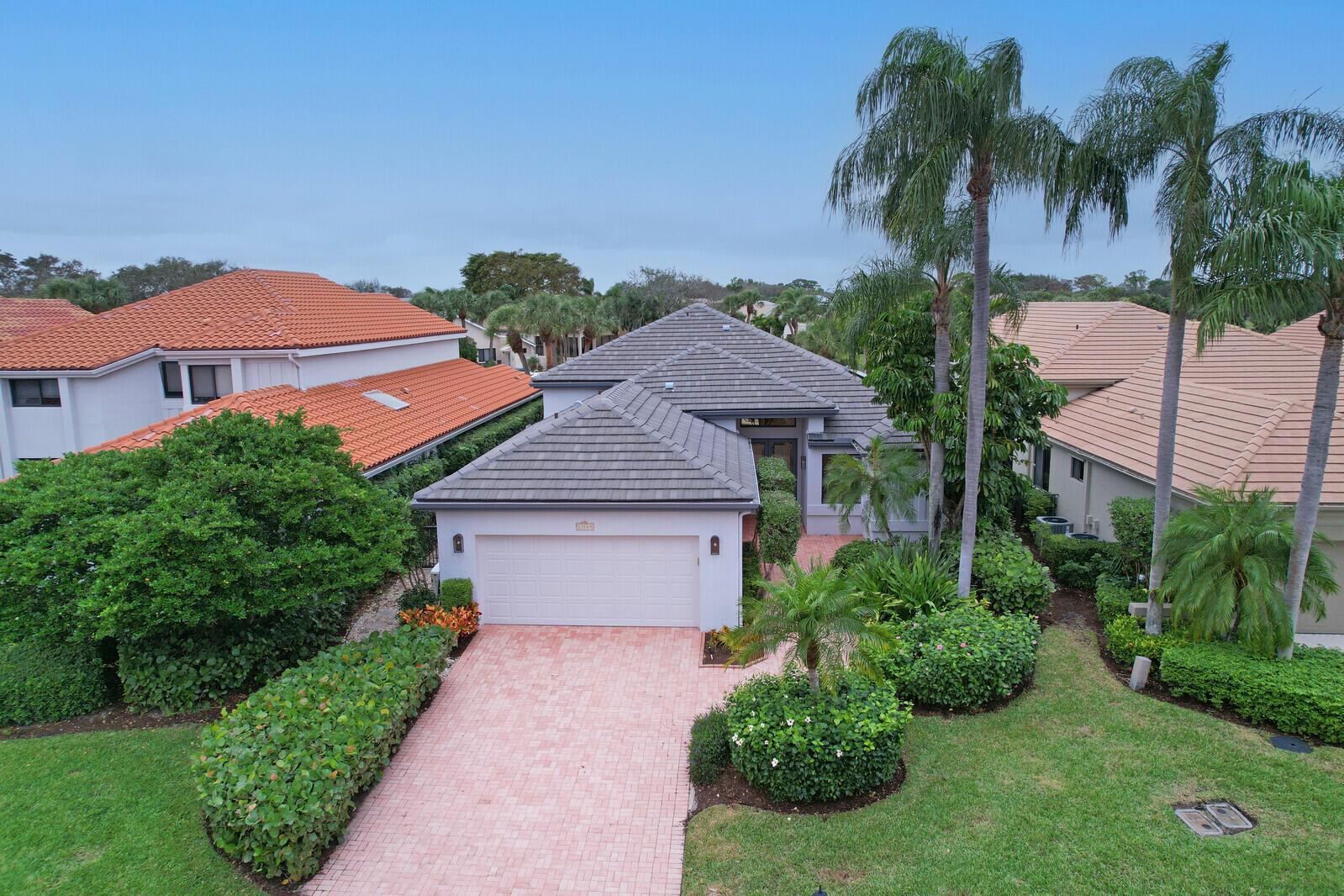 This home features relaxing water and golf views! It offers 3 bedrooms, 4 full and one half baths on one story which is close to the Cluhouse and golf facilities. Updates include; carpet, tile, corian countertops, a generator, and hurricane shutters. Close to the clubhouse and golf faculties.