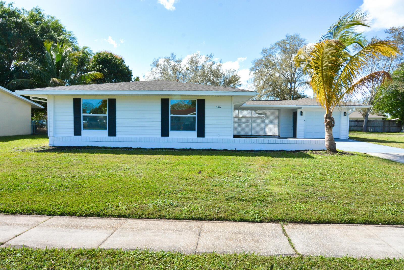 Photo 0 of home located at 316 NE Orchard Street, Port St Lucie FL
