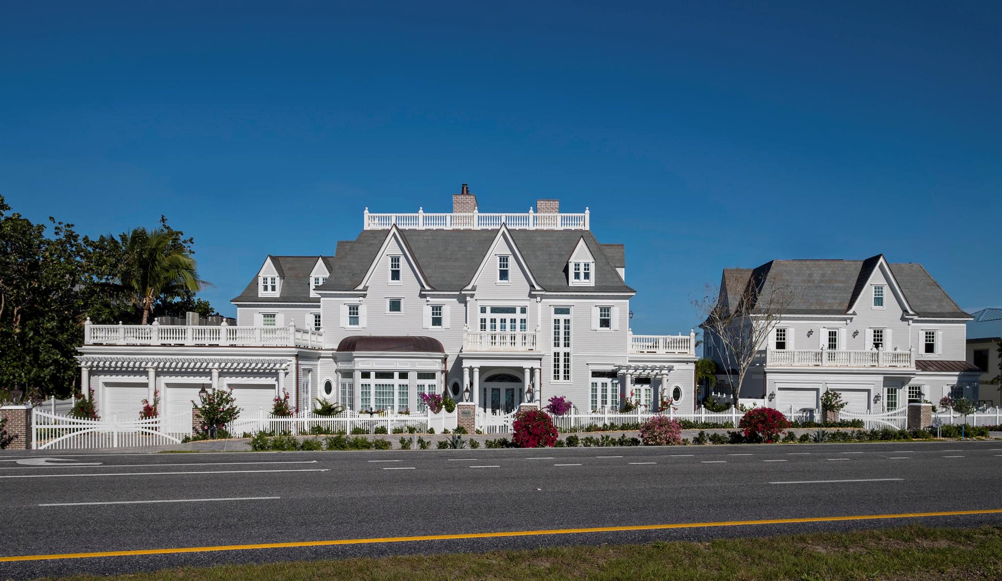 Welcome to Anglesea Estate, an extraordinary Victorian-inspired waterfront retreat that combines timeless elegance with modern luxury.  Situated along 200' of the pristine Intracoastal waterway over-looking Jupiter Island. Anglesea sweeping views from nearly every room, allowing you to fully embrace the coastal lifestyle.  Inside, discover dual master suites on both the 1st & 2nd floor; with the 2nd floor suite featuring his & her baths and massive, custom-built closets. It boasts intricate custom millwork, expansive floor-to-ceilng windows, and exquisite reclaimed stained-glass transoms.  There is a separate 2-story guest house for the extended family  or a unique investment opportunity due to its specialized zoning, opening up a world of possibilities for the discerning buyers..