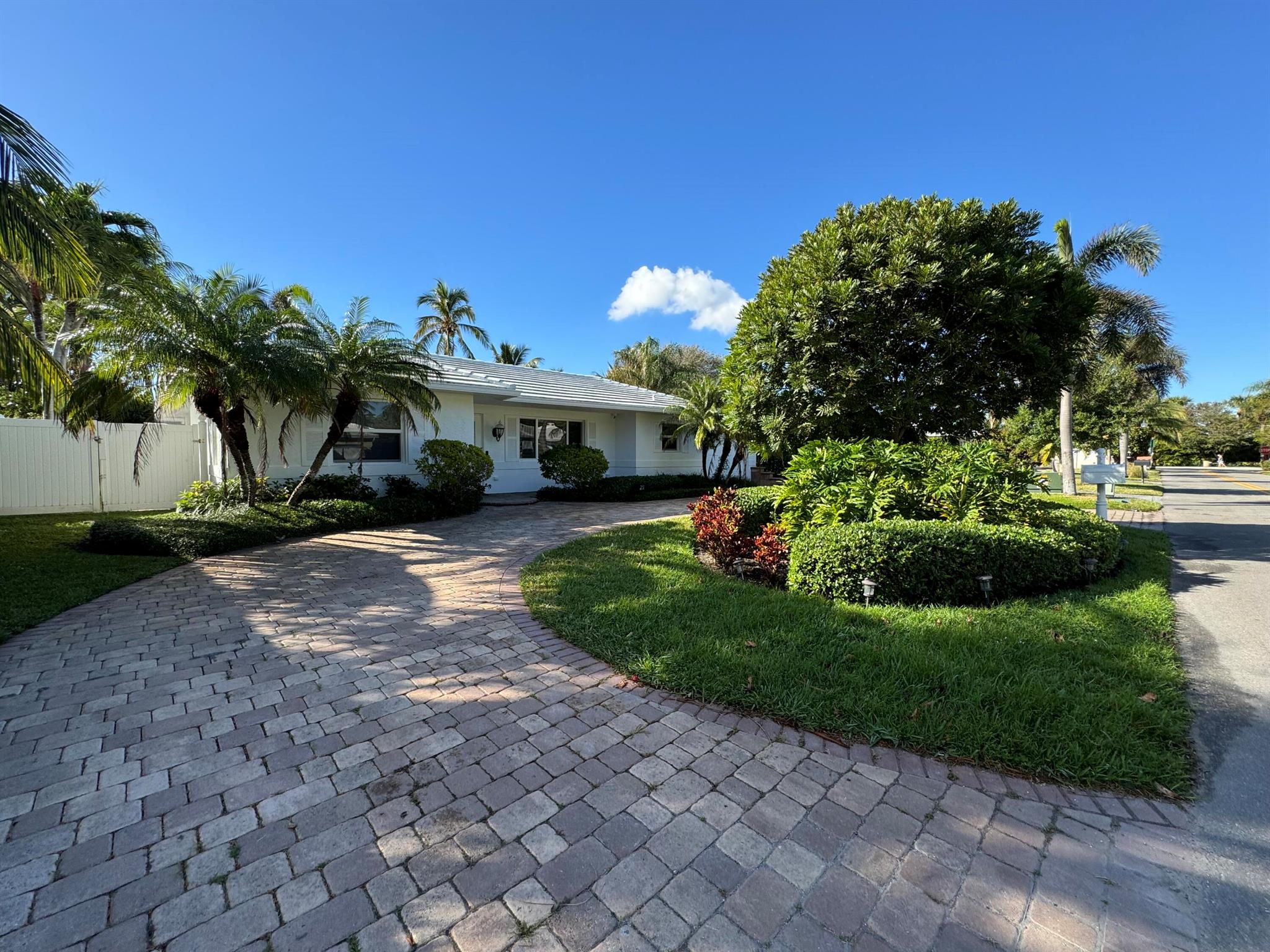 Welcome to Paradise Island Living!! Located in the quaintest and most desirable neighborhood of Palm Beach Shores, this gem is perfect for year round relaxing! Walking distance to beach, inlet, famed Sailfish Marina and so much more! Beautiful pool and spa with lush landscaping is the heart of the entire home making it easy to access from any room. Features include 3 spacious bedrooms, 3 unique bathrooms with jacuzzi and clawfoot tub, plantation shutters throughout, pass through window bar to outdoor entertaining area, every closet has custom cabinets and shelving, one car garage to store all the beach toys, updated appliances and so much more! You do not want to miss this rare opportunity to live in a true one of a kind charming island community!