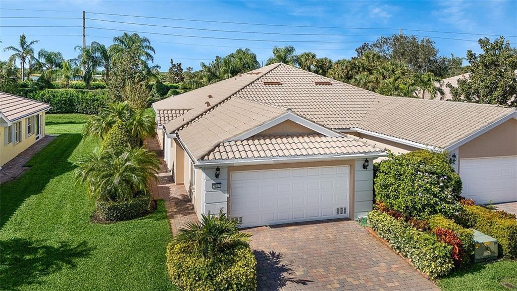 Divosta CAPRI 2 BD/2 BA Villa in the resort style living community of the Isles @ Waterway Village. All IMPACT Windows, a rare find, for a true Lock-n-Go! White Cabinets, Granite Countertops in kitchen, plantation shutters, upgraded lighting & fixtures, new refrigerator, 2019 HVAC, newer HWH, walk-in shower in primary bathroom; split bedrooms with privacy doors for guests. Recreational facilities include clubhouse, heated pool, tennis/pickleball courts, fitness center, gathering social area. Conveniently located to shopping, dining and the BEACH. Your Getaway for the Winter Awaits!!