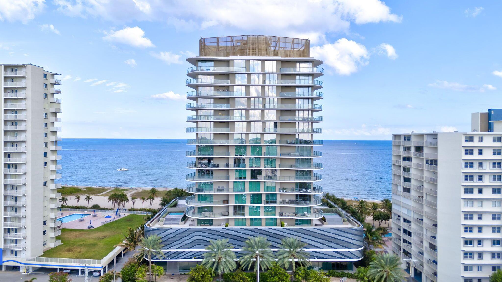 Live your dream lifestyle at Sabbia Beach in this oceanfront penthouse corner unit, 2BR,  2.5BA and a 500 sq. ft. wrap-around balcony. Enjoy floor-to-ceiling windows, 10-ft ceilings, and sweeping views of the ocean, Intracoastal, and city skyline. The open-concept design features Italian contemporary cabinetry, quartz countertops, a waterfall kitchen island, and high-end Miele & Subzero appliances. Two primary suites offer luxurious retreats. Sabbia Beach elevates resort-style  living with exceptional amenities which include beach cabanas, full beach service, a sparkling  pool, hot tub, spa, fitness center, sauna, grilling area, fire pit, 24/7 valet service, dog run and an exclusive  private party room. Resort living at its finest!