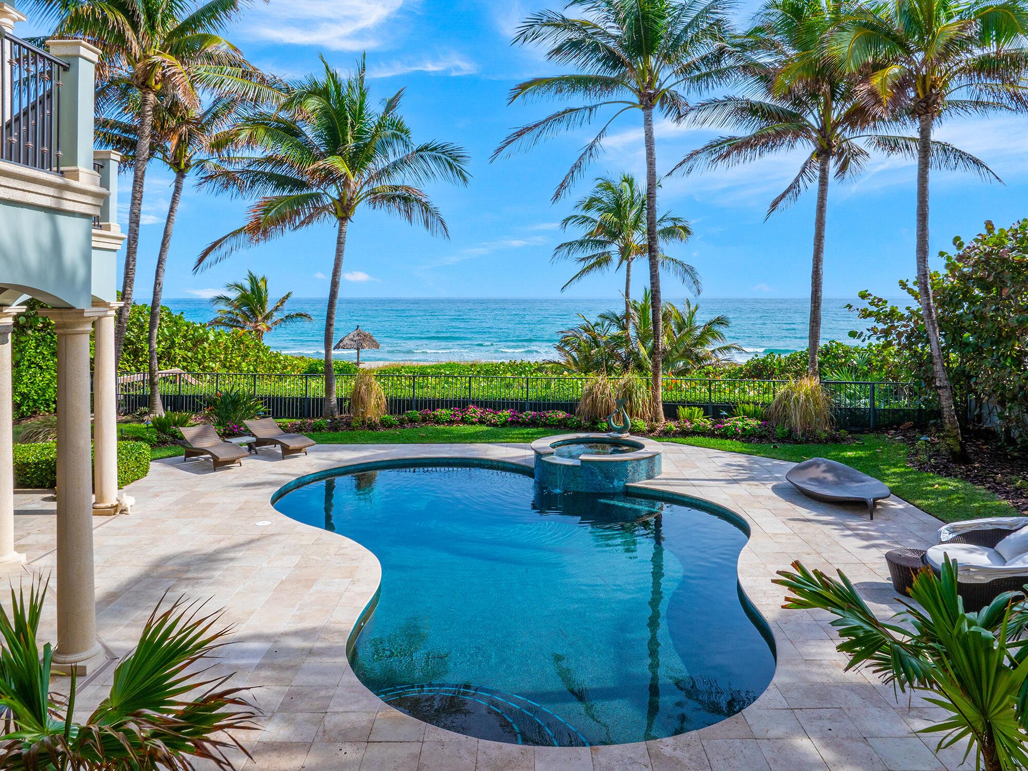 The height of luxury awaits at this premier oceanfront residence, a serene haven in the exclusive enclave of Byrd Beach. Close to vibrant Delray Beach and Boca Raton yet worlds apart, You will immediately be struck by the peace and privacy surrounding this Mediterranean-inspired estate. Nearly 9,400 square feet in total, including shady terraces and a sparkling waterside pool, the home's timeless design, fine craftsmanship, and lavish finishes impress at every turn. Inside, soaring ceilings and vast windows offer mesmerizing views from nearly every room. Exquisite entertaining spaces, a chef's kitchen, a family room, and a sumptuous primary suite, one of 4 ensuite bedrooms, further elevate the home while an underground garage and elevator add to the WOW factor of this gorgeous retreat.