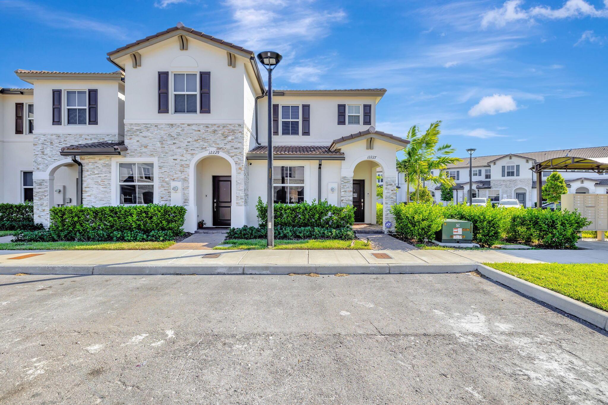 Welcome to this stunning 3-bedroom, 3-bath townhome in a secure, gated community. Enjoy resort-style amenities, including a clubhouse, pool, gym, playground, and dog park. The home features an open floor plan with tile flooring, a chef-inspired kitchen with quartz countertops, and high-end stainless steel appliances. Each bedroom has its own private bath for ultimate comfort and privacy. Additional upgrades include new blinds on all windows and sliding glass doors, a tankless water heater for endless hot water, and upgraded impact windows for added safety and efficiency. Call today for more information and to schedule an appointment!