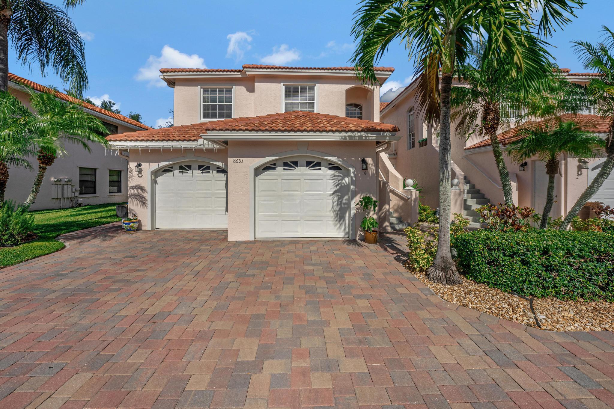 Beautifully maintained gated Villa San Remo at Boca Raton open to all ages. Gorgeous engineered wood floors and wood blinds. Sunny space with vaulted ceilings allowing for spacious green views. Thoroughly updated kitchen and baths, all with high-end finishes. All decorator grade lighting and hardware. Custom wood 42'' cabinetry in eat-in kitchen featuring lighted cabinets with pull-outs. Glass mosaic backsplash with granite countertops and s/s appliances. The primary bedroom includes walk-in closets. The exquisite ensuite spa like bath features a double vanities and a a frameless glass shower. The laundry room includes a washer, dryer, and additional storage. The third bedroom has a double-door entry and closet, making this a cozy retreat. Newer roof, HWH, and energy-efficient AC. bringing a touch of luxury to your daily routine. Wood blinds add privacy and style to most windows.
This pet-friendly, ALL AGES community offers an array of fantastic amenities, including 24-hour manned gate security, tennis and pickleball courts, a fitness center, playground, basketball courts, and a resort-style pool with a spa, sauna, and kiddie pool. Maintenance fees cover exterior painting, insurance, lawn care, roof maintenance and replacement, cable, and internet.
Conveniently located near excellent schools, top-tier restaurants, and shopping, this home provides the ultimate in both luxury and convenience. Don't miss out on this amazing opportunity&#x14;schedule your private tour today!
