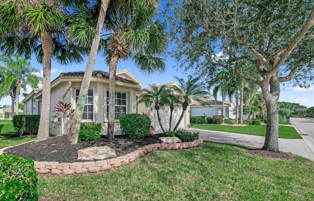 WATER,WATER WOW! Peace & Serenity from the moment you enter this beautifully landscaped home with an open&airy light,bright feeling!Wonderfull curb appeal invites a sense of calmness.Newly remodeled 2 1/2 bathrms,updated lighting,crown molding,plantation shutters,accordion shutter hurricane protection&an oversized screened lanai on the lake are just a few of the fabulous upgrades! Open the owners suite sliding glass doors to lanai&lake,enjoy the newer luxury wood Bedrm floors!Closets in all the bedrms are a nice size! Newer stainless appliances, white cabinets, granite kitchen! WALK TO 6 PICKLEBALL CRTS,Bocce,Tennis,Social clubhouse,Glorious tropical pool,restaurant,shows,clubs,cards,more!State of Art Fitness Ctr,Beauty Salon!Amenities galore!AMAZING PRICE!Live Valencia life!LOVE IT! HOA monthly includes outside painting of home, hi speed internet wi-fi, cable tv includeing HBO, restaurant credit, in home security system, lawn maintenance, 10 tennis,, 6 pickleball, 3 bocce crts, indoor racquetball, indoor whirl pool, full time pro and social director. At least one person on deed must be 55 or plus. Enjoy the Resistance Pool, lap pool, water aerobics, park like setting of Valencia Shores is unmatched! Gorgeous! Love this country club lifestyle without the country club dues!